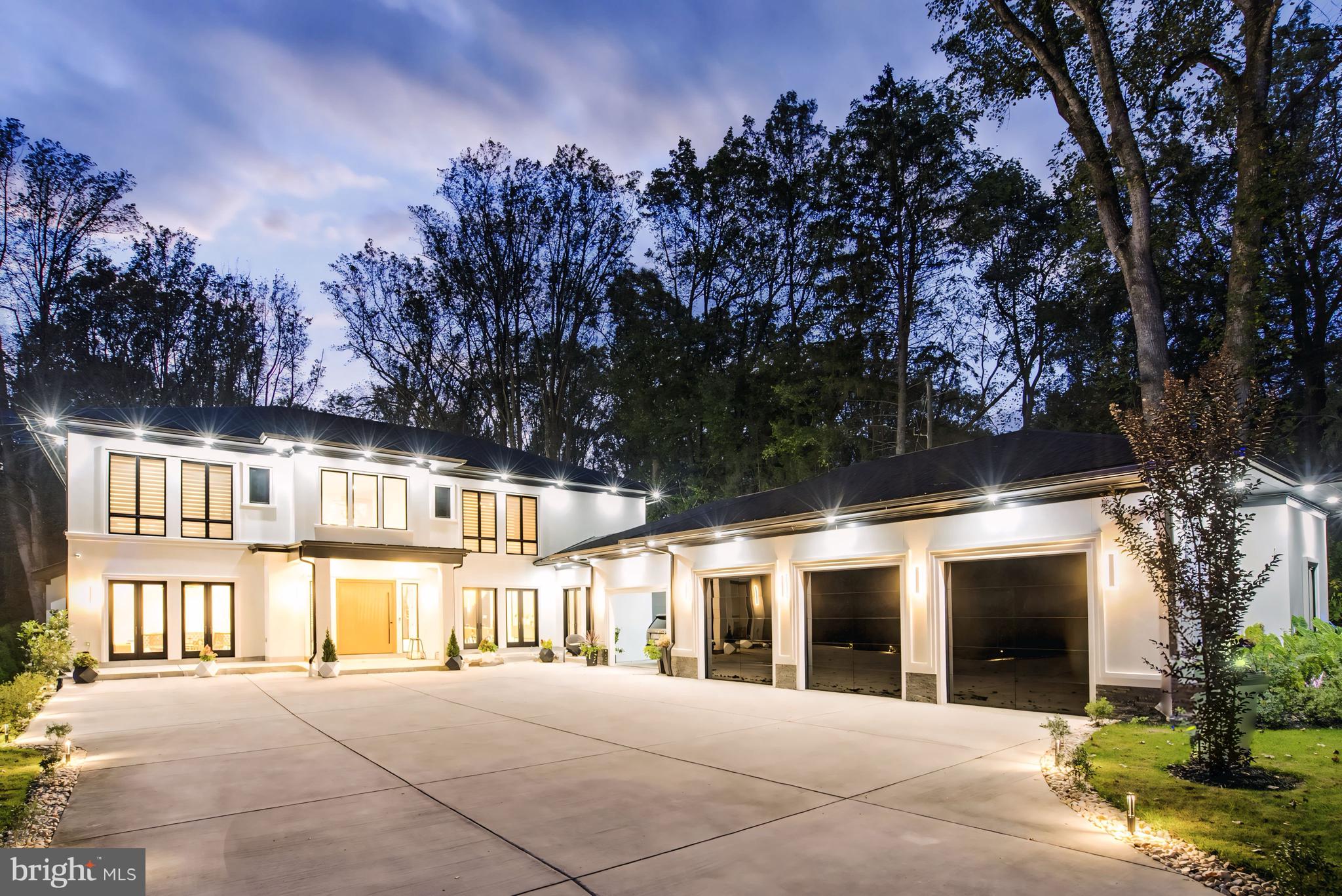 Discover this magnificent estate, meticulously crafted by Gold Construction, set on 2 sprawling acres. The timeless stone and stucco exterior is complemented by a grand custom 6x8 mahogany door, and high-quality Pella doors and windows, offering a striking first impression. Step inside to a breathtaking two-story foyer that leads into the elegant living room, complete with a cozy fireplace, and a formal dining room. The spacious family room, bathed in natural light, features a second fireplace and opens to a chef’s dream kitchen with sleek Leicht German cabinetry. Outfitted with a premium Blue Star range, Miele appliance to include built-in coffee maker and wine cooler with sommelier set. The main level also includes an office, a guest bedroom with an en-suite bath, and a well-designed mudroom with built-ins and a custom dog-washing station. A striking floating staircase or a convenient elevator will guide you to the upper level, where the luxurious owner’s suite awaits. This private retreat boasts a tray ceiling, a relaxing sitting room, a custom walk-in closet, and a spa-inspired bath with a soaking tub, steam shower, and double vanities. Three additional bedrooms, each with private baths and custom walk-in closets, and a full laundry room complete the upper floor. The walk-out lower level is an entertainer’s paradise. Designed with stunning Spanish porcelain tiles, it features a custom wet bar with a dishwasher and double beverage center, a 500-bottle wine room, a state-of-the-art home theater with heated and massage seats, and a guest bedroom with a full bath and walk-in closet. The expansive, level backyard provides a world of possibilities, ready to be customized to your vision—whether you're seeking a peaceful retreat or an entertainer's paradise. The three-car garage, featuring striking 9x9  Envy translucent glass doors and soaring 12-foot ceilings, blends practicality with modern design. An attached breezeway offers extra parking with ease and added convenience, ensuring every detail of the home is designed for comfort and functionality. Please fill out registration form.