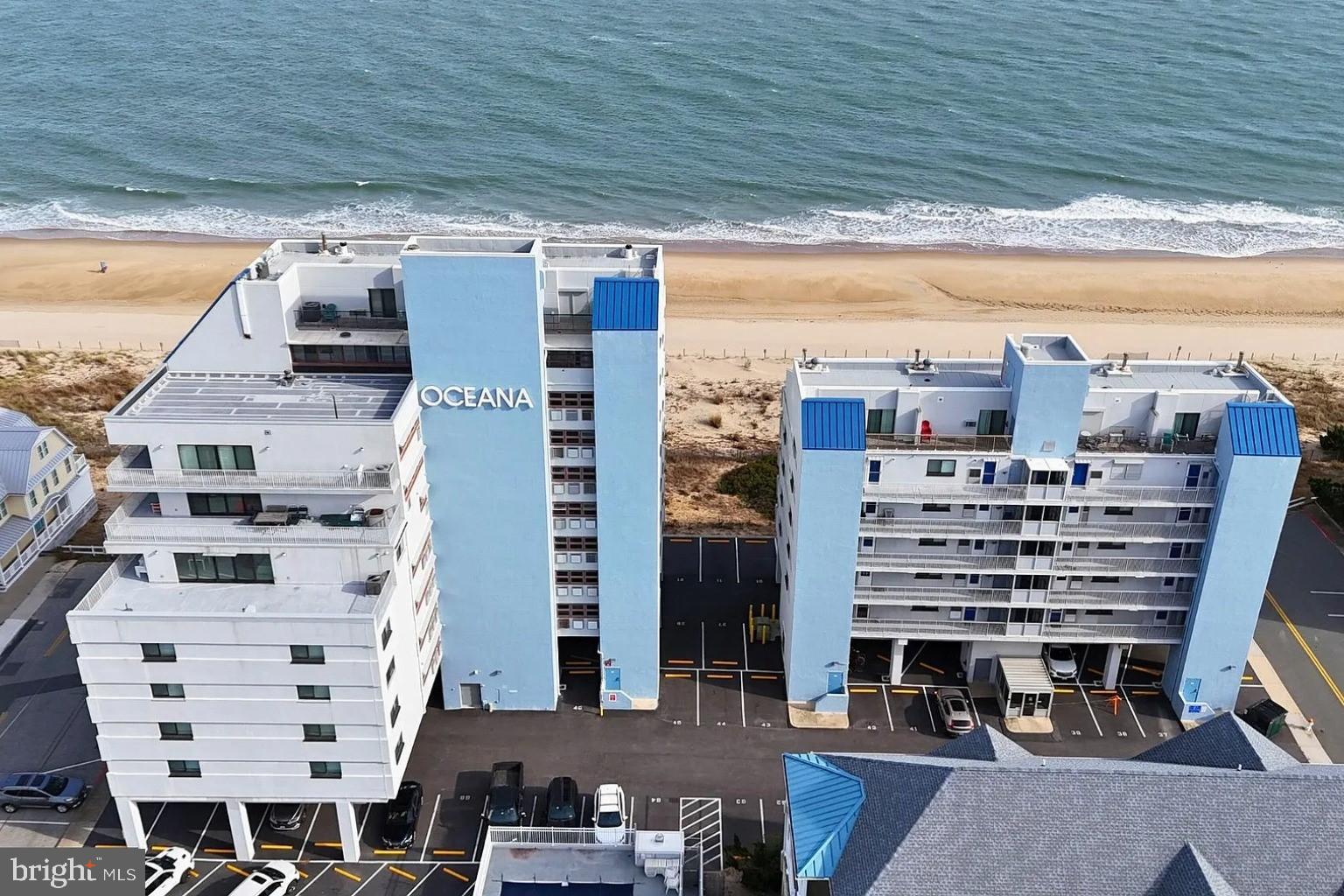 This stunning penthouse unit in the Oceana building offers an exceptional investment opportunity with breathtaking ocean and water views. Spanning 900 sq. ft. , this one-bedroom, two-bathroom residence features an inviting layout enhanced by skylights and elegant window treatments, creating a warm and airy atmosphere. The semi-modern kitchen is equipped with essential appliances, including a dishwasher, and electric oven, ensuring convenience for everyday living. Step outside to enjoy the wrap-around balcony and deck, perfect for soaking in the coastal breeze. The community amenities include a refreshing outdoor pool and easy access to the Atlantic Ocean, ideal for water enthusiasts and VACATION RENTAL$$$. The potential for rental income is endless!!! This property is a smart choice for investors seeking both comfort and returns on investment. The elevator access and outside shower add to the convenience, making this penthouse a true gem in a prime location. 1 parking space is assigned. Don't miss the chance to own a piece of paradise!