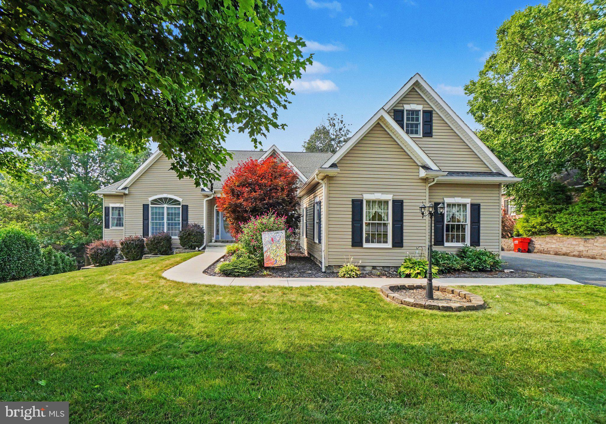 Amazing and well-maintained 5-bedroom, 3 full / 1 half bath custom ranch estate with a fully finished walkout lower level, nestled in the prestigious Woodcrest subdivision of scenic Waynesboro, PA. Surrounded by breathtaking mountain vistas, this remarkable residence offers a refined blend of sophistication, comfort, and timeless craftsmanship.
Step inside to experience an expansive open-concept layout adorned with grand-scale living spaces, stunning stone fireplaces, rich custom wood cabinetry, gleaming solid hardwood flooring, and luxurious quartz countertops. The gourmet kitchen is a chef’s dream, featuring nearly new appliances, a double wall oven, a spacious walk-in pantry, and exceptional storage and workspace. As an added bonus, three refrigerators convey with the sale, providing incredible convenience for entertaining, meal preparation, and extended family living.
Walls of windows invite an abundance of natural light, creating a warm, radiant ambiance that enhances the home’s exceptional architectural beauty. A truly distinguished feature of this residence is the private lower-level in-law suite, thoughtfully designed as a fully independent secondary living quarters—perfect for multi-generational living, extended family, or long-term guests. This impressive retreat features a full gourmet kitchen, an expansive living area anchored by a striking stone fireplace, and two additional bedroom options, offering privacy, flexibility, and effortless walkout access.
Completing this extraordinary property is a spacious side-load two-car garage, adding both convenience and elegant curb appeal. Every detail of this magnificent custom Woodcrest residence has been meticulously curated, delivering an unparalleled lifestyle of luxury, versatility, and distinction.