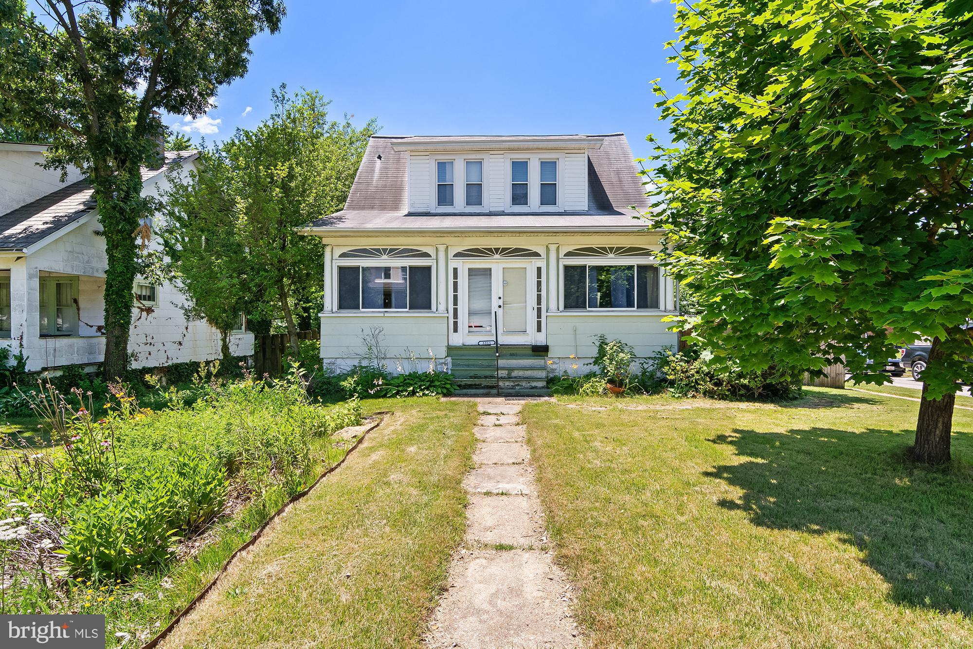 This spacious single-family home in the desirable Hamilton area is full of character and ready for your personal finishing touches!  Situated on a huge corner lot, you'll have plenty of space to host summer cookouts, gather around a fall bonfire, or toss the football during game day.   Step inside through the inviting covered front porch/four-season room and you'll immediately feel at home. The main level blends timeless charm with tasteful modern updates, creating a warm and welcoming atmosphere throughout.
Featuring 3 generously sized bedrooms and 1.5 bathrooms, this home offers plenty of room for today's lifestyle, with space to grow. The lower level provides excellent storage and additional living space, perfect for a home office, rec room, home gym, or relaxing retreat.  Out back, you'll find one of the home's standout features—a large screened-in porch that's ideal for entertaining, your morning coffee, or an evening breeze without the bugs and out of the summer sun.  Large corner lot has a fully fenced rear yard and off-street parking.  Home has new 200-amp electrical service.  If you're looking for a home with classic charm, generous outdoor space, and endless potential, this Hamilton gem is one you won't want to miss!