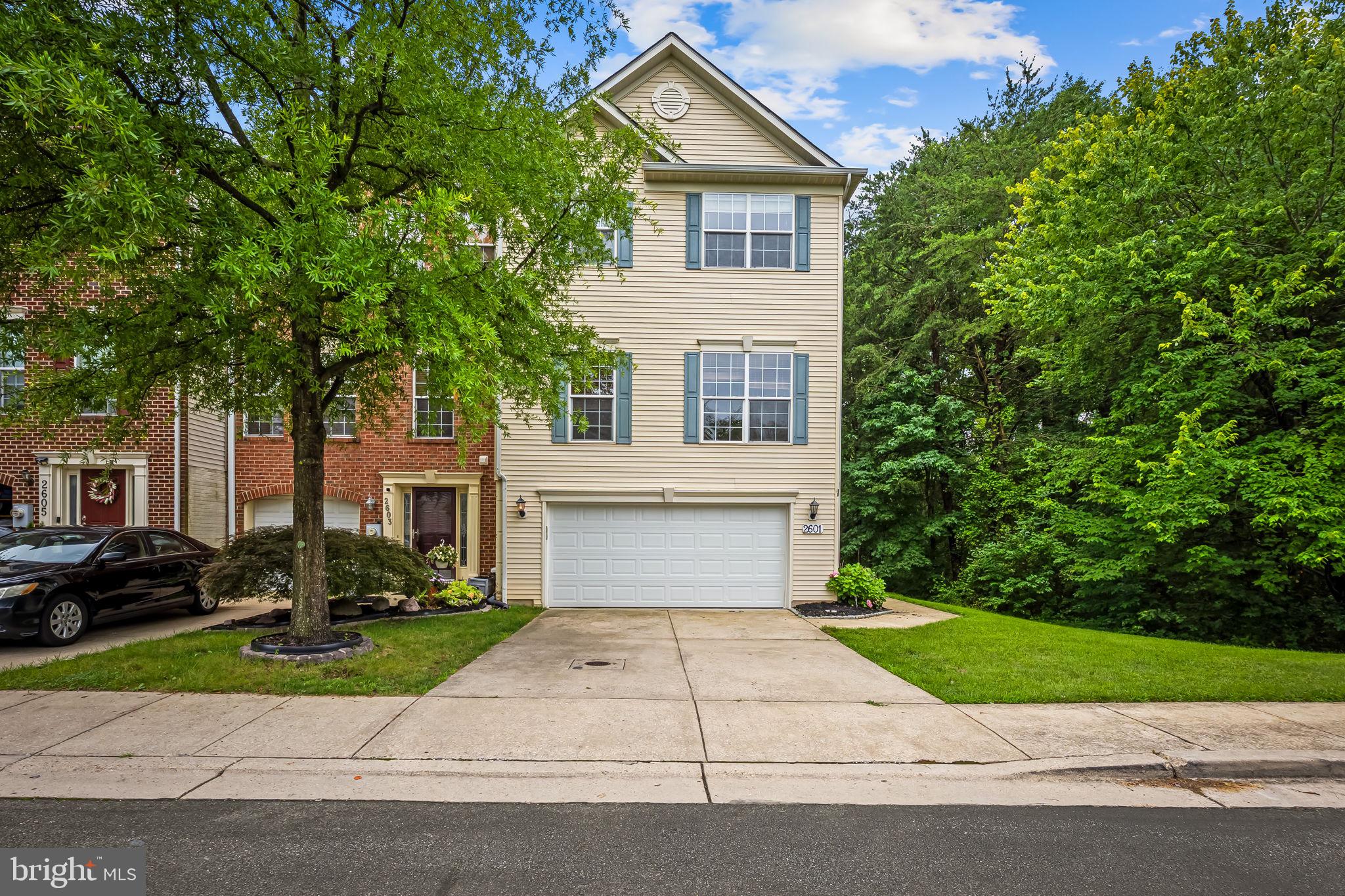 Welcome to 2601 Rainy Spring Court, a beautifully maintained 2-car garage townhome in the highly sought-after Seven Oaks community. Offering over 2,500 square feet of living space, this is one of the largest townhomes in the neighborhood. Upon entry, you'll be greeted by a spacious lower-level recreation room, perfect for a family room, home office, or entertainment space. The main level features an expansive living room, convenient powder room, and a bright, open kitchen with stainless steel appliances and ample dining space. Step outside to the rear deck, ideal for relaxing or entertaining guests.

The upper level boasts a spacious primary suite with a private en-suite bath, along with two additional bedrooms and a full hall bathroom. Prior to hitting the market, the home will be freshly painted and receive brand-new carpeting, making it truly move-in ready.

Conveniently located near Fort Meade, NSA, the Odenton MARC Train Station, Annapolis, BWI Airport, shopping, dining, and major commuter routes including Routes 32, 95, 97, 295, and 100. Enjoy all the amenities and convenience that Seven Oaks has to offer in this exceptional home.