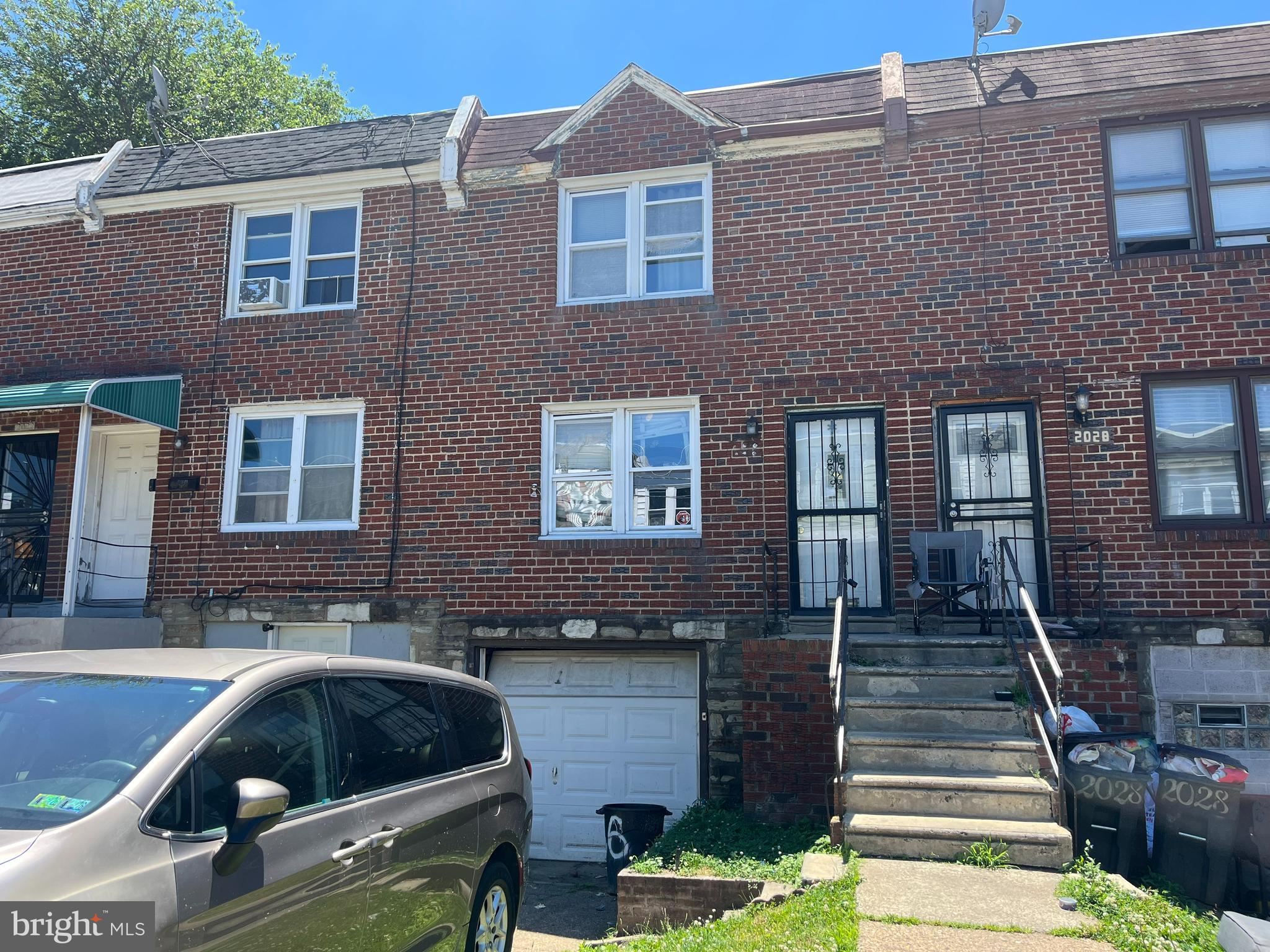 Investor Special! Don't miss this opportunity to restore and add value to this 3-bedroom, 1-bath row home located in the desirable East Germantown section of Philadelphia. This property offers a traditional floor plan with a spacious living room, formal dining room, and kitchen on the main level. The second floor features three well-sized bedrooms and a full hall bathroom.

The walk-out lower level includes a separate laundry area, access to the rear yard, and a one-car attached garage, providing plenty of storage and additional potential. The home also features replacement windows and central air conditioning—valuable upgrades already in place.

This property is in need of renovation and is being sold strictly as-is. Buyer will be responsible for obtaining any required certifications, completing the cleanout, and the property will not be delivered free of personal property or debris. Seller will make no repairs.

Ideal for investors, contractors, or buyers looking to renovate and build equity. Cash, hard money, or renovation financing only. Conveniently located near shopping, public transportation, schools, parks, and major roadways, making it an excellent opportunity for your next investment project.
