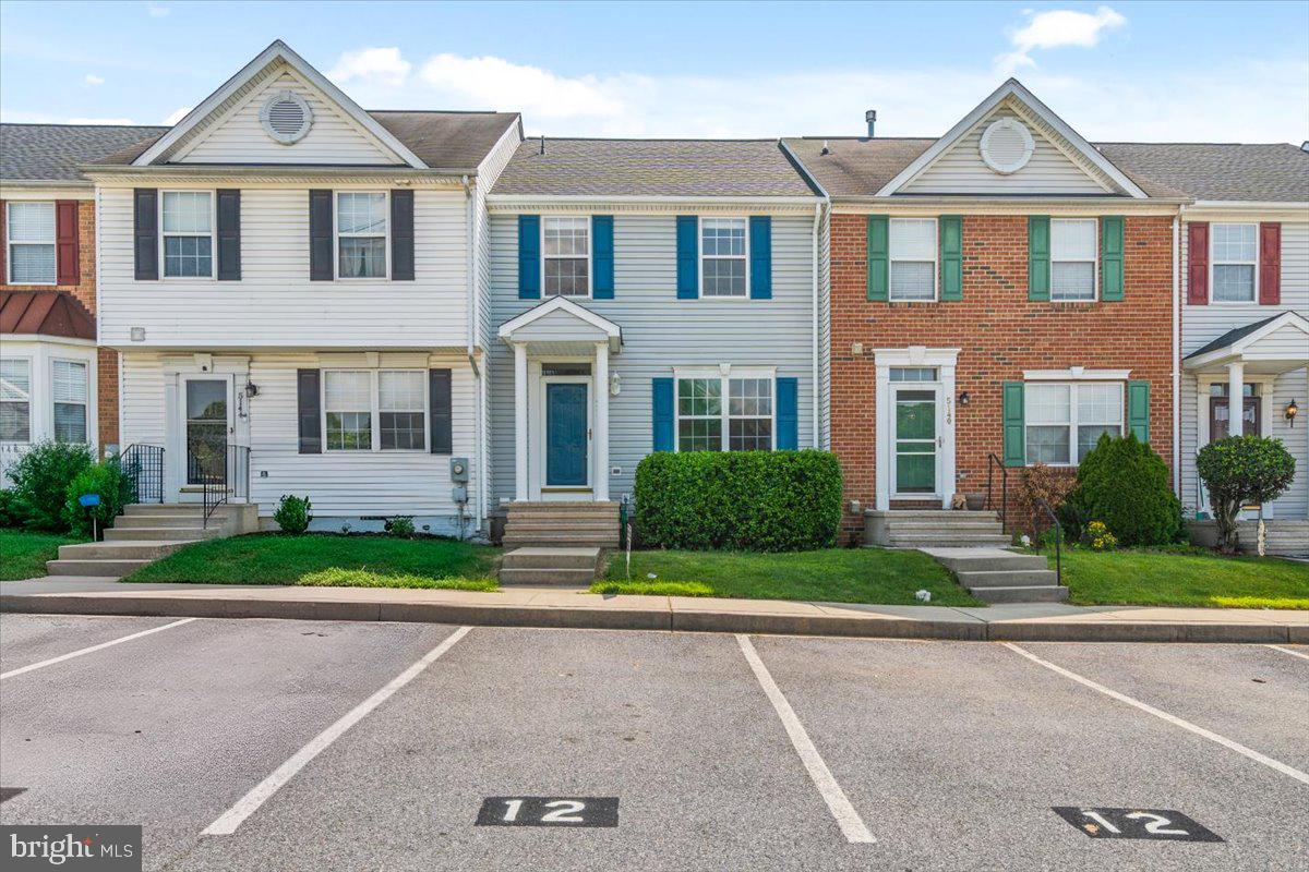 Welcome to this beautiful home in the desirable Wellington Trace neighborhood of Frederick!  This home has been lovingly maintained by the current owners and features a brand NEW ROOF from June 2026, recently restored deck and newer hvac system. The main level offers a renovated kitchen, living area with hardwood floors throughout, dining area and ease of access to rear deck. The warm hardwood floors, clean paint, creates an inviting space for everyday living and entertaining. Step outside to a deck off the main living area, overlooking a fully fenced backyard, perfect for relaxing or hosting gatherings. Upstairs, the primary bedroom features a private ensuite bath, joined by two additional generously sized bedrooms sharing a full bath. The finished lower level offers versatile guest space/home office with a full bathroom, media room/rec room, and walk-out to rear patio. A brand-new roof adds extra peace of mind for the next owner. Wellington Trace is an ideal location due to: NO CITY TAXES,  TWO ASSIGNED PARKING SPOTS, community swimming pool just in time for summer, and just minutes from three major commuting routes. Additionally, you are close to two MARC stations, AKA Friscos, and all that downtown Frederick has to offer. Enjoy easy access to shopping at Westview Promenade and outdoor escapes like Carroll Creek Park and Market Street shops and dining. This one truly checks every box. Run to this opportunity!