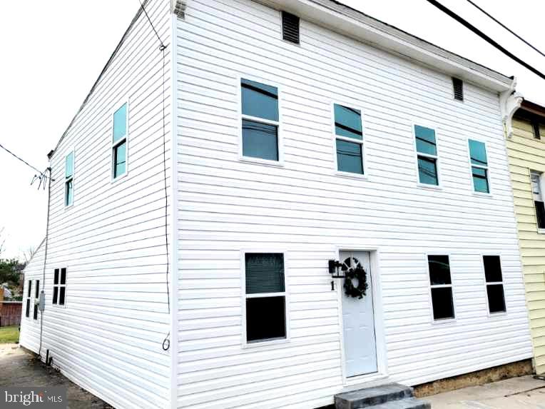 Recently renovated 4 bedroom 2 bath home  in Smithsburg, MD! Enjoy a brand new kitchen and two full baths.  First floor laundry and bedroom.  New siding, windows, and  gutters. New central HVAC and water heater. Plumbing and electrical are also all new.  Even the basement has been completely restored with a fresh concrete floor, sump pump system, paint and insulation.  Mud/sunroom opens up to the fully fenced back yard. Close to schools and park.