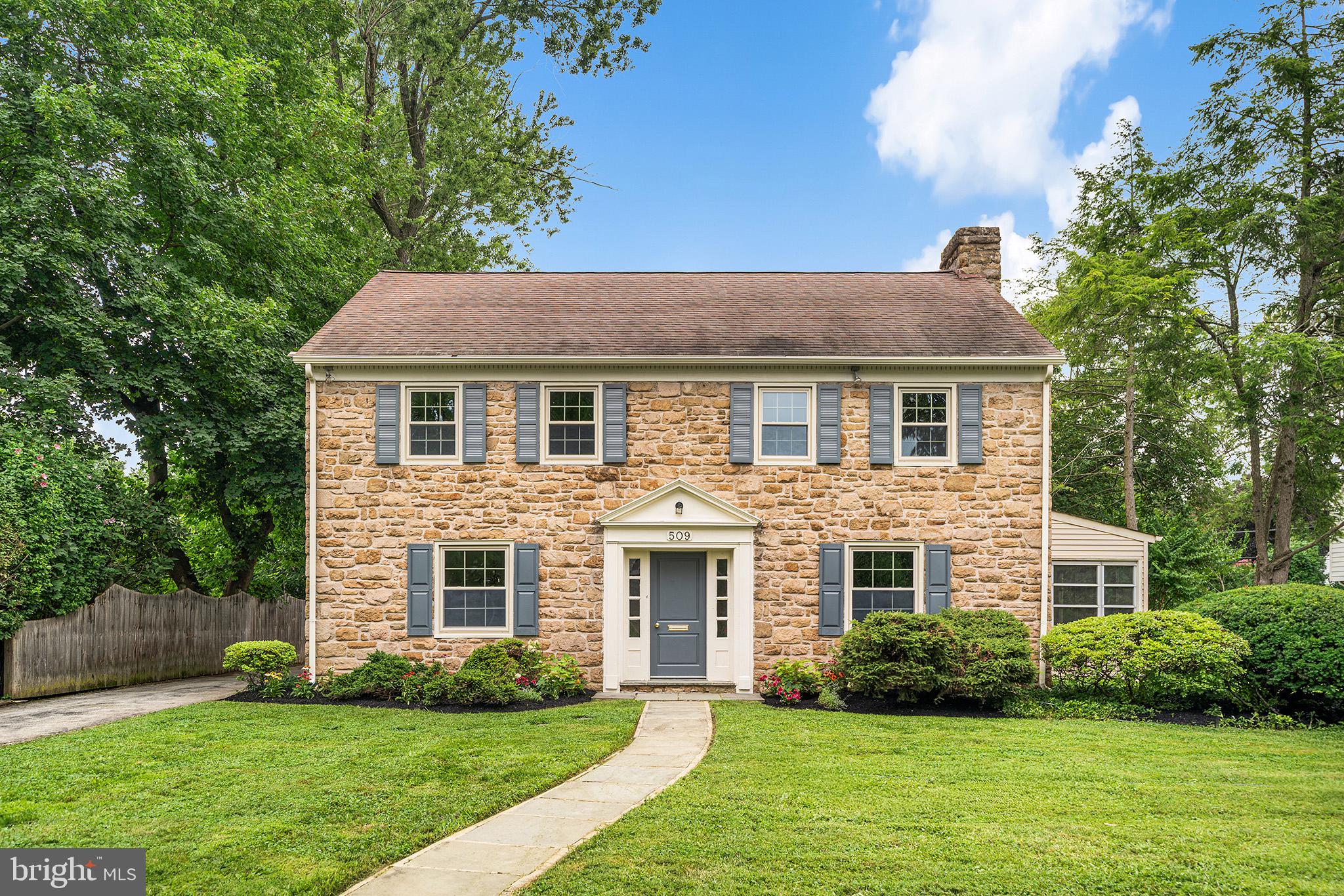 Nestled in a charming neighborhood of Swarthmore Borough, 509 Westminster Avenue exudes warmth and character, making it the perfect retreat for those seeking comfort, space and a walkable lifestyle. Built in 1942, this residence combines classic architectural elements with modern conveniences, offering a unique blend of history and functionality. Step inside to discover a spacious interior that boasts approximately 2,154 square feet of thoughtfully designed living space. The traditional floor plan features 3 large bedrooms and 2.5 bathrooms, ensuring ample room plus an office space on the first floor that could easily be converted into a 4th bedroom. The heart of the home is the living room, complete with a fireplace that creates a welcoming ambiance. The eat-in kitchen features space for casual dining and a pantry closet for all your culinary needs while the formal dining room is perfect for hosting gatherings. Throughout the home, the deep window sills bring character to the space and the original hardwood floors enhance the charm. The fresh, neutral paint and natural light create an airy atmosphere. Upstairs, all three bedrooms are expansive with walk-in closets and the primary bedroom has an en-suite bath and linen closet. Enjoy fresh air on the enclosed and screened-in porch, or take in the views from the roof deck. Venture outside to explore the lovely exterior features, including landscaped front and rear yards. The level lot offers plenty of space for outdoor activities and gardening. Parking is a breeze with the attached garage and driveway that accommodates additional vehicles. The unfinished basement presents an opportunity for customization, whether you envision a recreation room, additional storage, or a workshop. This wonderful home is just a 15 minute walk to Swarthmore Borough’s shops and restaurants and conveniently less than a block from the Rutgers Avenue fields and playground, all within the sought after Wallingford-Swarthmore School District.  Additional features include central air, windows that have been replaced and a walk-up attic with additional storage and possibilities.  With its classic charm and freshly painted interior from top to bottom, this property is ready to welcome you home! Don’t miss the opportunity to make 509 Westminster Avenue your own!