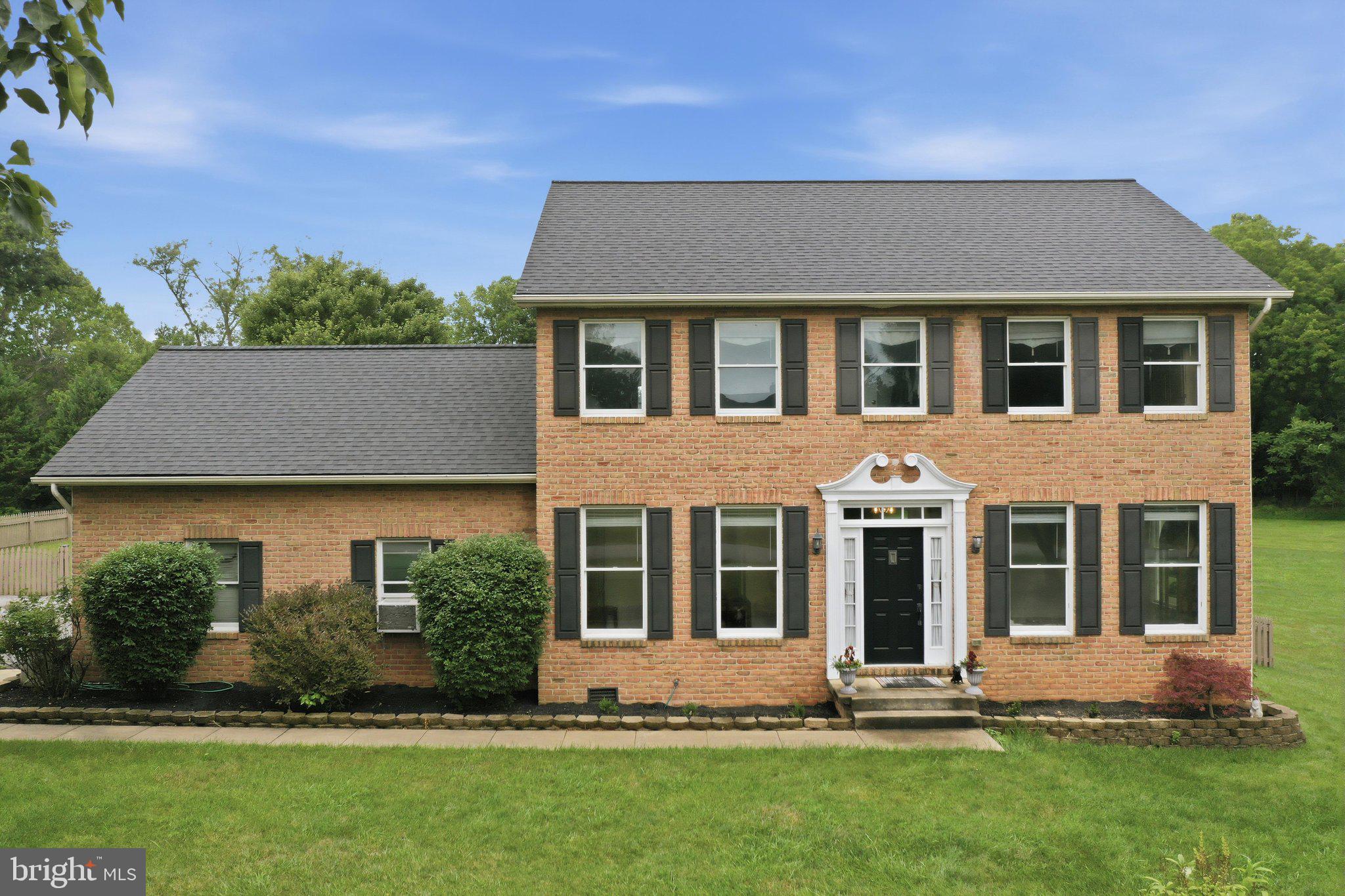 Welcome to a home where comfort and convenience come together beautifully. This home is nestled on over an acre in Chateau-Gai, one of Martinsburg's established, mature communities. This beautifully updated property offers the privacy you've been looking for while remaining just minutes from shopping, dining, healthcare, and I-81 for an easy commute.

Inside, you'll find fresh updates throughout, including all-new luxury vinyl flooring across the main level, brand-new carpet upstairs, and beautifully refreshed bathrooms featuring new flooring, vanities, mirrors, and paint. The spacious primary suite offers two closets and a completely updated ensuite bath with a new walk-in shower, creating the perfect retreat at the end of the day.

The heart of the home flows effortlessly into the outdoor living space where a 20' x 40' rear deck overlooks a large backyard with a generously fenced section—ideal for pets, play, gardening, or entertaining family and friends. Cozy evenings can be made even better with the warmth of the propane fireplace, while practical updates like a new roof (2024) and well pump (2021) provide added peace of mind.

Car enthusiasts, hobbyists, and those needing extra storage will appreciate the oversized two-car garage complete with additional attic storage accessed by pull-down stairs.

Enjoy the best of both worlds with a peaceful neighborhood setting just minutes from The Commons shopping area, Poor House Farm Park, Berkeley Medical Center, the Martinsburg MARC train station, and convenient access to I-81. If you've been searching for a move-in ready home with generous outdoor space, thoughtful updates, and an unbeatable location, this one is ready to welcome you home.
