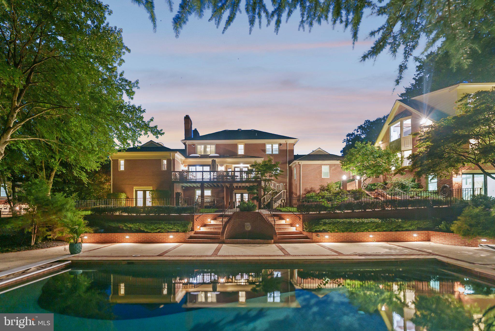 Welcome to 10709 Stapleford Hall Drive in the sought-after Kentsdale Estates of Potomac, MD! This remarkable 6-bedroom, 7.5-bathroom home offers  over 8,000 square feet of luxurious living space. As you step through the elegant Provia double front doors, you're greeted by a grand two-story foyer adorned with high-end finishes. The open-concept living room seamlessly flows from the foyer and features a coffered ceiling, a grand fireplace, a Miele coffee wall, and surround sound speakers.

The gourmet kitchen is a chef’s dream, complete with quartz countertops and accordion doors that open directly to the pool deck—ideal for effortless indoor-outdoor living. The primary bedroom (on the main level) serves as a true sanctuary, boasting vaulted ceilings, a spacious walk-in closet, and a spa-like ensuite bath designed for ultimate relaxation. The additional bedrooms are both generous in size and versatile, each having its bathroom, ready to meet any lifestyle needs.

Entertainment is made easy in the finished basement,  with a fully updated second kitchen, adding extra convenience and functionality. All of this leads to an incredible outdoor experience. 

Step outside to your private outdoor oasis, featuring a below-ground pool with an automatic retractable cover and diving board. The updated pool house, with brand-new flooring, provides a chic and functional space for poolside gatherings. This can easily be used as a multi-generation dwelling, as it features its own full bathroom, loft, and living room. The fully fenced-in lot ensures privacy and security for all your outdoor activities. The home has been enhanced with all-new windows, doors, and garage doors, contributing to its modern appeal.

Conveniently located just 15 minutes from Washington, DC, 10 minutes from Montgomery Mall, 5 minutes from Potomac Village, and 2 minutes from Falls Road Golf Course and several prestigious country clubs, this home offers unparalleled access to both urban and leisure activities. Don’t miss the opportunity to make this exceptional property your own!
