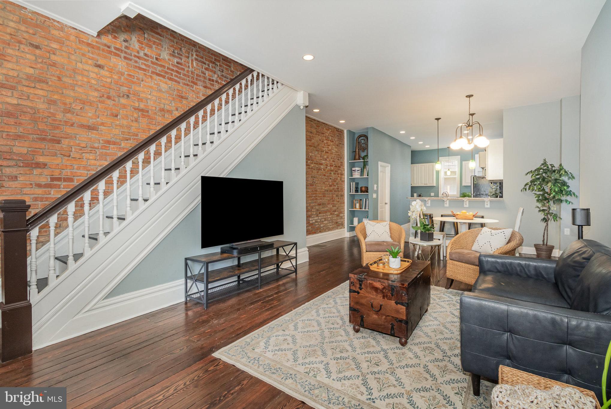 Welcome to 1909 N 2nd Street. If you're looking for modern updates and historic charm, this is the one. It truly has it all. Enjoy the classic front porch, tiled entryway, open floor plan, hardwood floors, and exposed brick. Kitchen with counter seating,  gas range and double sinks. All great for entertaining. Relax out on the back porch or patio with a privacy fence. Imagine retiring to the 3rd floor owner's suite, complete with walk-in closet and dedicated full bathroom. Three more bedrooms, full bath and laundry room with balcony complete the 2nd floor. Seller has also installed a whole house humidifier, smart thermostat, and smart recessed lighting. This home has so many great features to enjoy. Schedule your tour today.