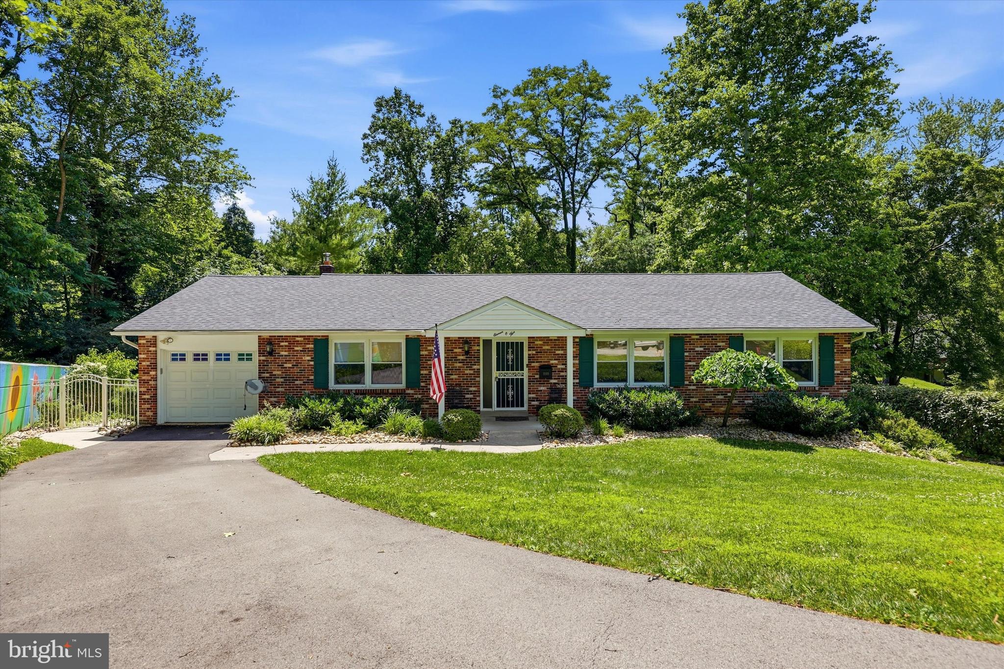 This beautiful and spacious rancher sits on an idyllic cul-de-sac surrounded by nature.  Set back from the street and away from neighbors, this property  provides privacy and serenity.  From the street you are greeted by a front lawn ,landscaping and a nice long driveway that offers space for up to three cars and entry to an attached garage. Enter the home with one step up into the living room area which is a large open-concept layout with the kitchen and dining room area. The home has a wonderful layout, is well maintained and clean throughout, with many upgrades. The large kitchen has expansive granite countertops, a kitchen island, wood cabinets and tiled floor. The washer and dryer are easy access in the kitchen and hidden behind bifold doors. The dining area right off the kitchen is a generous space for entertaining and connects to an enclosed sunroom with incredible serene views of the woods and the stream along with access to an attached  composite deck and stairs that lead to an in-ground swimming pool and the backyard. Down the hall from the main area are three large bedrooms. A generous primary suite and attached new bathroom with walk-in shower as well as two other bedrooms and a brand new hall bathroom with a beautifully tiled walk-in shower. Downstairs to the basement is another almost 1300 sq ft of space that incudes a family room area currently being used as a 4th bedroom, entire wall of built-in cabinets and another full bathroom with a tub/shower combination and an additional large storage space. There are many upgrades made at this property as well including a water purification system, a lawn sprinkler system, and a whole house generator that automatically turns on if the power goes off! The roof is new. New washer and dryer and a new chimney liner. Don't miss out on this one!