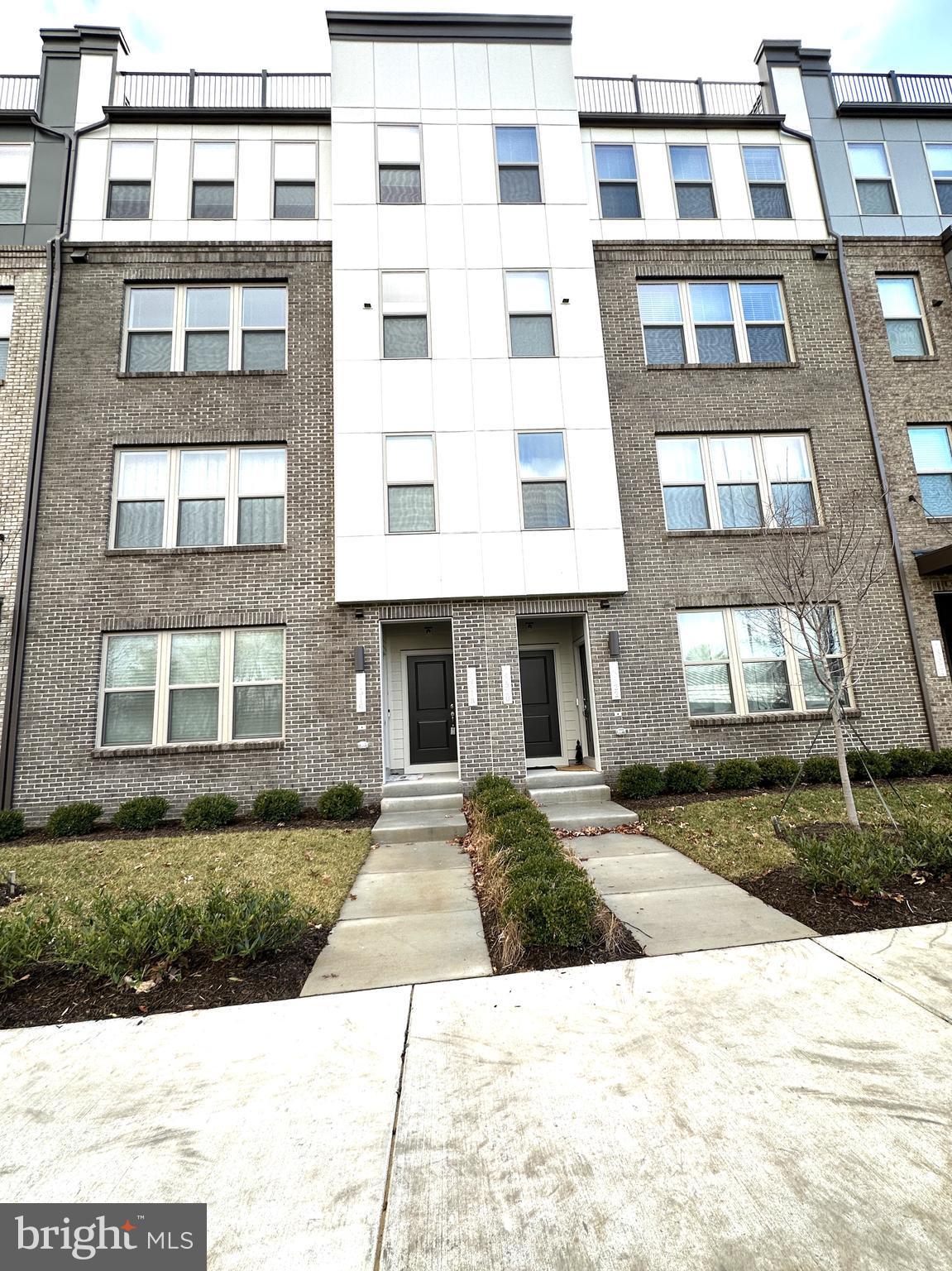 This pristine and luxurious, 2023 built  3-bedroom, 2.5-bath, upper-level two-story condo townhouse with a 1-car garage is ideally located in the heart of Herndon, ready to welcome new tenants. Water utility is included in the rent, offering added convenience. The main level features a stunning gourmet kitchen with extended countertops, ample cabinetry, a spacious pantry, and an additional storage closet. Equipped with premium GE Profile stainless steel appliances—including a double wall oven, cooktop, built-in microwave, and dishwasher—this kitchen is a chef’s paradise. The formal living and dining areas are perfect for entertaining, while a private balcony provides a relaxing retreat, complete with extra storage. Elegant hardwood floors flow throughout the entire main level, adding warmth and sophistication. Upstairs, you’ll find two generously-sized bedrooms with plenty of closet space and a hallway bath with dual vanities and a soaking tub. The expansive primary bedroom offers a large walk-in closet and a luxurious en-suite bathroom with separate his and hers vanities and a standing shower. Additional perks include a $100 repair deductible and a prime location within walking distance to Clock Tower Center, restaurants, and shops. You’re also just minutes away from Innovation Metro Station, major commuter routes, and the airport. This beautiful home is available now—don’t miss your chance to make it yours!