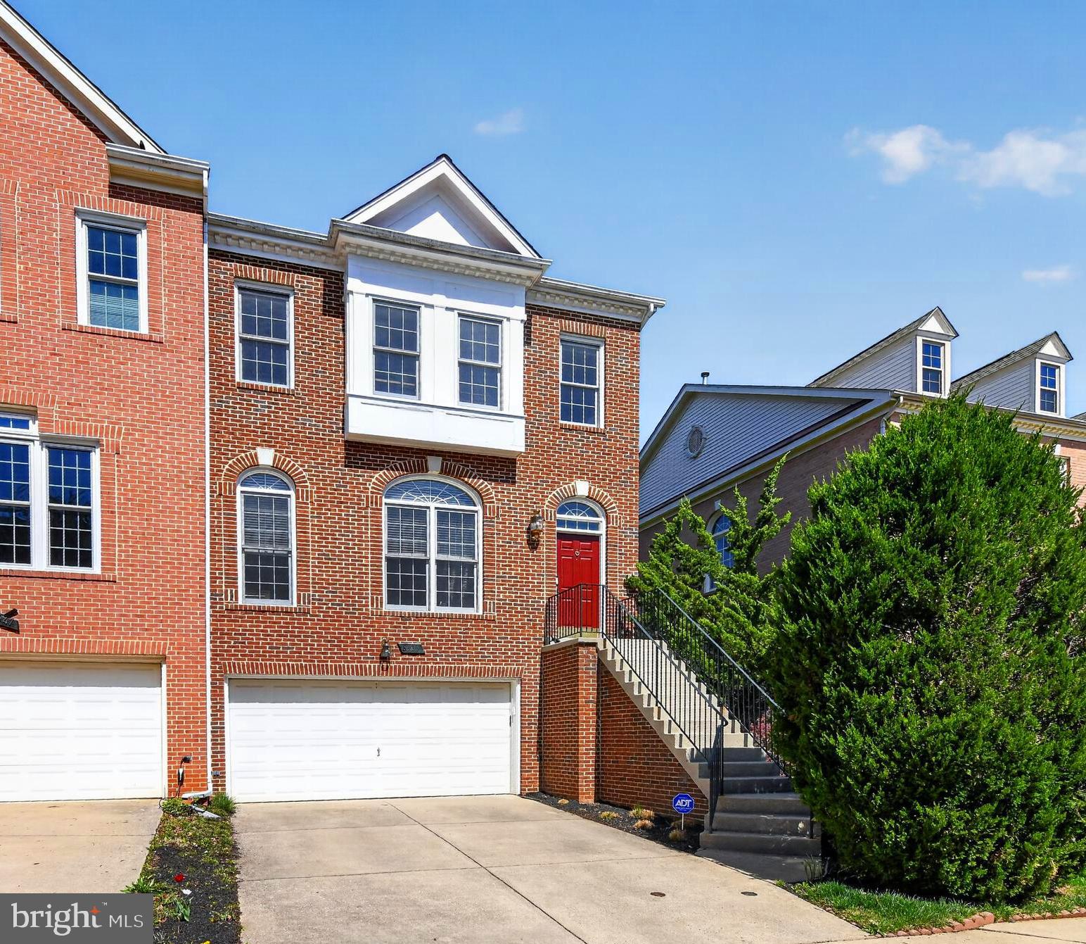 Beautifully updated, this 3-bedroom, 3.5 bath end-unit townhome offers over 3,100 square feet of thoughtfully designed living space, complete with an attached two car garage and equipped with an EV charger, all within the highly desirable Bells Mill Estates. The light-filled main level showcases hardwood flooring throughout and an inviting, open layout that seamlessly connects each living space. At the heart of the home, the gourmet kitchen is a chef’s delight, featuring crisp white cabinetry, granite countertops, recessed lighting, and a spacious L-shaped island that enhances both functionality and flow. The kitchen opens effortlessly to a cozy breakfast area and a generous family room, highlighted by a striking two-sided gas fireplace, large windows that fill the space with natural light and access to the rear deck. An updated powder room completes this level. Upstairs, the expansive owner’s suite impresses with a vaulted ceiling, a spacious sitting area, and a walk-in closet. The fully renovated en-suite bath offers a true retreat, showcasing a mid-century modern dual-sink vanity, a tiled walk-in shower with frameless glass doors, a standalone soaking tub, and a window overlooking mature trees, creating a peaceful space to unwind. Two additional generously sized bedrooms share an updated hall bath with a granite-top dual-sink vanity and a beautifully tiled walk-in shower. The versatile lower level features French doors leading to a large rec room with a second gas fireplace, an updated full bath, laundry room, and walk-out access to the rear yard, ideal for a home office, gym, or guest suite. Enjoy outdoor living on the rear deck or relax on the stone patio while overlooking the fully fenced yard, perfect for play or entertaining. Recent upgrades include the roof (2023), HVAC systems (2019 and 2023), and water heater (2019). A convenient rear gate provides direct access to Shady Trail, leading to Bells Mill Elementary, Georgetown Hill Early School, and Cabin John Middle School. Ideally located near Cabin John Shopping Center, Montgomery Mall, and Inverness Recreation Center, with easy access to I-270. Don’t miss this move-in ready gem within the Churchill HS cluster!