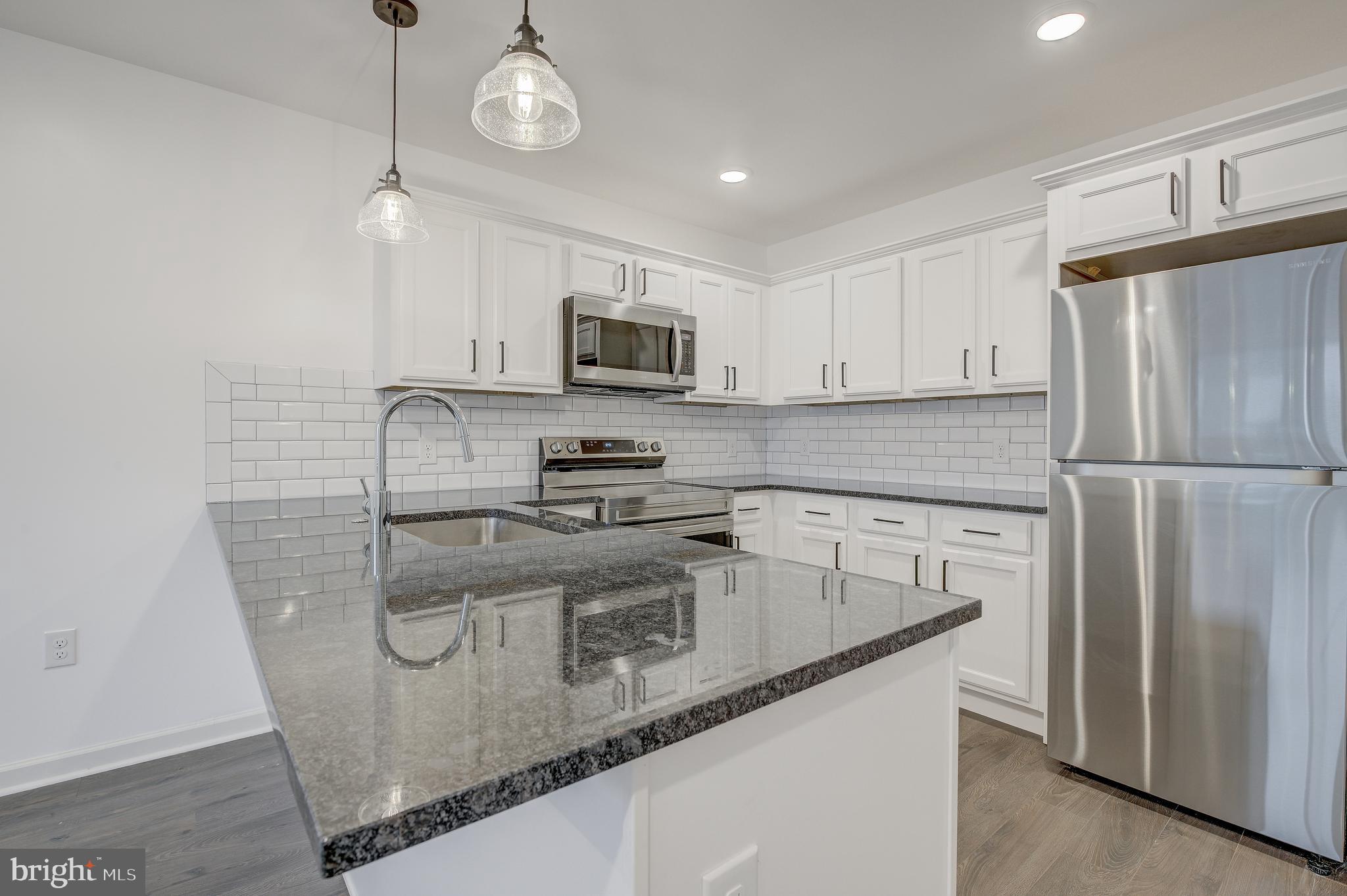 Available June 1st! Modern & Spacious one-bedroom coming available in a brand new construction apartment community. Located along Roxborough's vibrant Ridge Avenue corridor, convenient to shopping, dining, transit, and more! Your new home includes easy-to-clean  vinyl wood plank flooring, custom granite countertops, and large windows that let in tons of natural light. Stacked washer & dryer in the apartment with dishwasher & garbage disposal make chores a breeze! Stay comfortable year-round with individually controlled PTAC Climate Control in each room. All residents at Lilac Pointe can access the green roof deck, resident lounge, and fitness center for no additional charge. Plus, we are pet friendly with NO FEES! Apply today- this home will not last long!