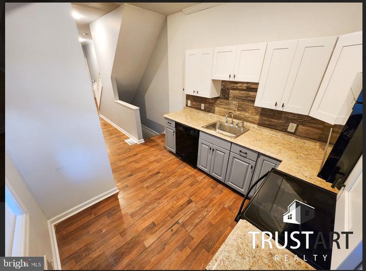 Welcome to your spacious 4-bedroom, 2-bath home! This tenant-occupied residence, professionally managed by TrustArt Realty, offers modern amenities to enhance your daily living experience. The current rent is $1,425 a month, making it an excellent investment property. Inside, you'll find a well-appointed kitchen featuring a microwave, dishwasher, stove/oven, refrigerator, washer, and dryer—making meal preparation and laundry tasks a breeze. The home is equipped with an electric water heater and an electric air-forced heater to ensure your comfort during all seasons. Step outside to enjoy the secluded backyard, perfect for outdoor gatherings or quiet relaxation. Additionally, you'll appreciate the basement, providing extra space for recreation, entertainment, or storage. Conveniently located in North Central Philadelphia, you'll have easy access to shops, restaurants, and public transportation, providing the perfect balance of urban convenience and suburban tranquility. Don't miss out on this fantastic opportunity! Schedule a viewing today and experience its charm in person. *Photos taken before tenants moved in. Property currently in similar condition.