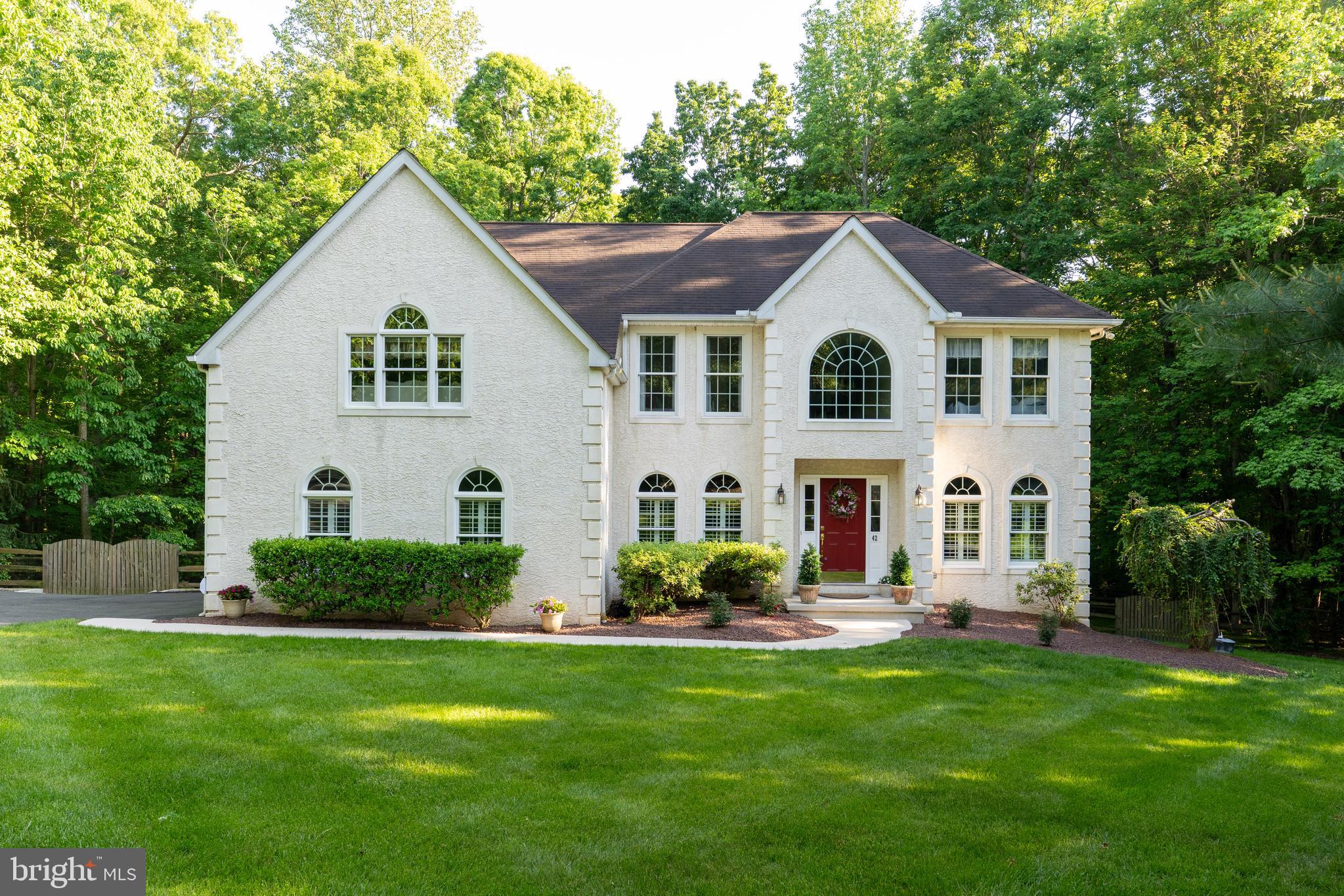 Beautiful Custom Colonial in the Sought-After Woodholme Section of the Villages of Elk Neck. Discover this wonderful custom-built 4-bedroom, 2½-bath colonial nestled at the end of a quiet cul-de-sac in one of the area’s most desirable communities. Set against a backdrop of serene, wooded open space, this home offers the perfect blend of privacy, nature, and everyday comfort. Step inside to a dramatic two-story foyer that creates an immediate sense of welcome. The inviting family room features a cozy fireplace—ideal for gathering with loved ones—while the bright, south-facing kitchen fills with natural light and overlooks the partially fenced backyard and tranquil forest views. Upstairs, you’ll find spacious bedrooms including a relaxing primary suite, while the large finished walk-out basement provides versatile additional living space—perfect for a recreation room, home gym, or media area. The two-car garage offers convenient parking and storage, complemented by a backyard shed for even more space. Enjoy the beauty of the community with its tree-lined sidewalks, scenic ponds, and open spaces—perfect for a morning walk or evening bike ride. Located on the Elk Neck peninsula, this home is just minutes from top school, the Elk and North East Rivers, Elk Neck State Park, a private airport, and the charming historic town of North East with its exceptional dining and shopping. This home truly has it all—location, comfort, and character. Sale is contingent on sellers finding suitable housing.   New first floor carpet installed spring 2026.  Front walkway and back patio sealed May 2026. 
Your dream home awaits—schedule your private tour today!