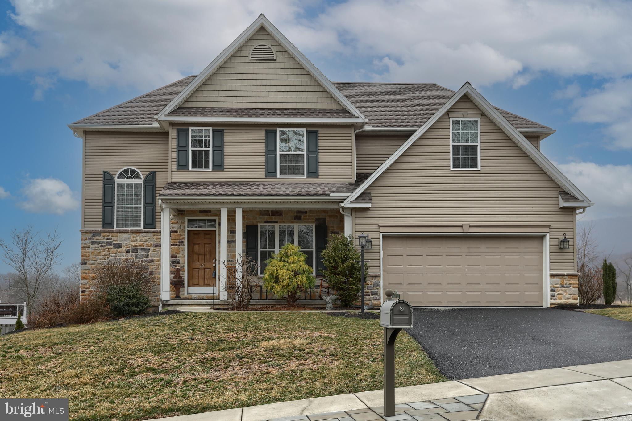 Welcome home to this very well maintained 4 bedroom home. On the first floor you will find a formal dining room, spacious living room with gas fireplace and vaulted ceilings, a breakfast nook and open kitchen with granite counter tops. Also located on the first floor is a large bedroom and full bathroom. Off the breakfast nook you will find a 16x11 deck overlooking your back yard with views of the mountains. Located on the second floor are the primary bedroom with tray ceilings, a sitting area and a full private bathroom with soaking tub and large walk-in closet. Two additional bedrooms and full bath are also found on the second floor. Enjoy amazing mountain views from the loft space which would be perfect for a home office or reading nook. The outside features include a professionally built rain garden, custom hard and landscaping including a stone stair pathway from the front of the house to the back.  The unfinished basement is waiting for your final touches. The oversized space would be perfect for a second living room with windows and sliders to the 13x11 covered patio. This home also comes with a 1 year CINCH home warranty for your peace of mind.