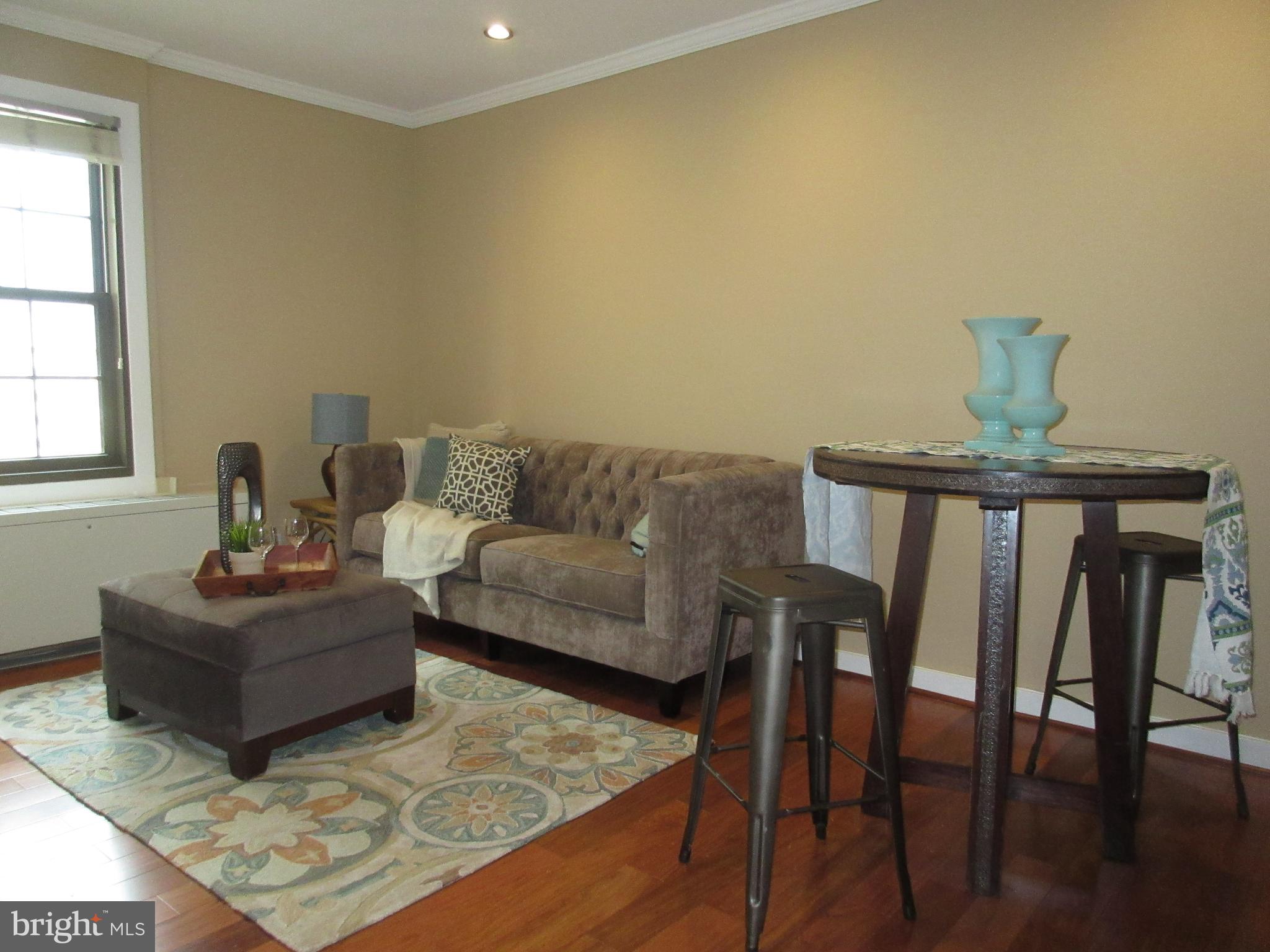 Junior one bedroom at Parc Rittenhouse!

This unit features wood floors throughout, as well as an updated kitchen and bathroom. The spacious kitchen features stainless steel appliances, tile flooring, granite countertops, and a breakfast bar. The bedroom has a wall closet and access to a nearby marble-appointed bathroom with a shower/tub.
Residents of Parc Rittenhouse enjoy a 24-hour doorman/concierge, state-of-the-art fitness center, clubroom and boardroom and a seventh-floor rooftop club featuring an outdoor pool, whirlpool spa, kiddy pool and sundeck with lounge chairs. Location is everything: Rittenhouse Square is ranked the 6th best neighborhood in North America by Places Rated Almanac. There are 175 restaurants and 199 retailers within a three block radius. Within close walking distance to the Market Street office corridor, The Avenue of the Arts and University City. 30th Street Station and Philadelphia International Airport are only minutes away.