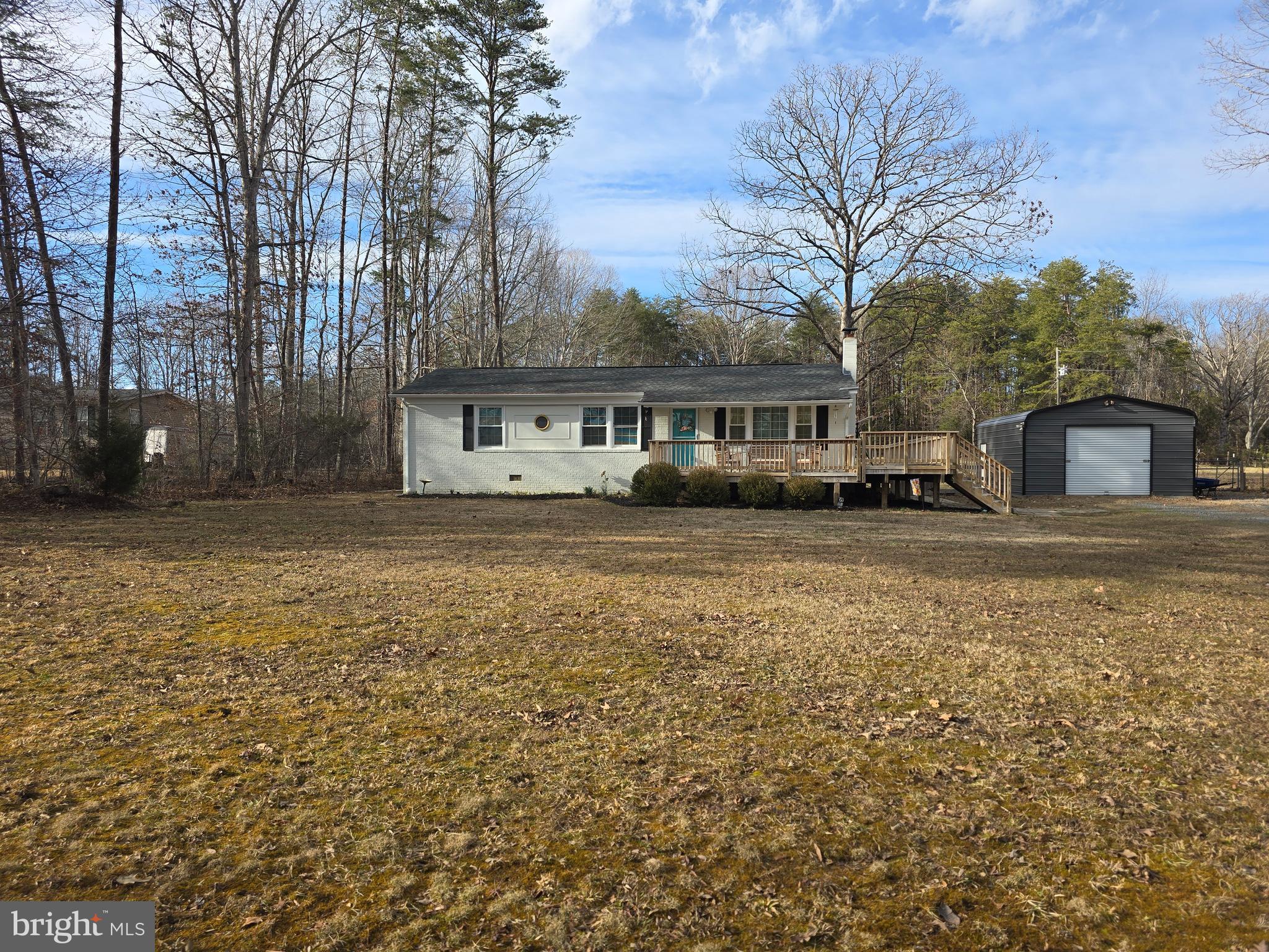 **Back on the market NO FAULT TO THE SELLER*
Charming Country Rambler on 1.29 Acres – Perfect for Livestock!

Escape to the countryside with this beautiful 3-bedroom, 2-bathroom rambler nestled on 1.29 acres! This home offers a fully fenced backyard, making it ideal for livestock or pets. Enjoy peaceful mornings on the wrap-around porch, or take advantage of the huge steel garage with electricity—perfect for a workshop or extra storage.

Inside, you’ll find an updated master bathroom, LVP flooring in all bedrooms, and stainless steel appliances in the kitchen. Additional upgrades include a brand-new well pump and a spacious driveway with plenty of parking. Don't miss this perfect blend of comfort and country living—schedule your tour today!