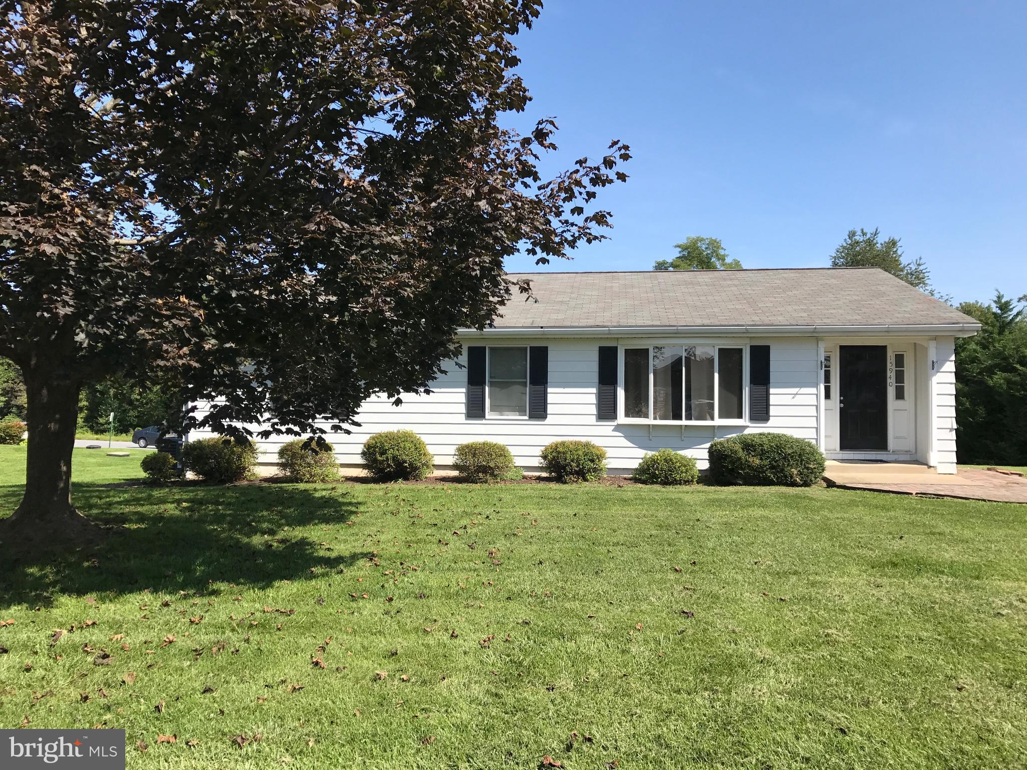Spacious 3 bedroom, 2.5 bath rancher available for rent in sought after Western Howard County.  Generous size rooms, fresh paint, and lovely deck off the dining room.  Major renovations were  completed  within the year with 2 new bathrooms, new kitchen and LVT throughout the main level.  Sizeable walkout basement is finished with a half bath.  Plenty of parking, and convenient to I70.  This house has commercial zoning so you can live on one floor and work on the other.  Acceptable credit/background check required, No smoking and no pets. Professionally cleaned and ready to go!