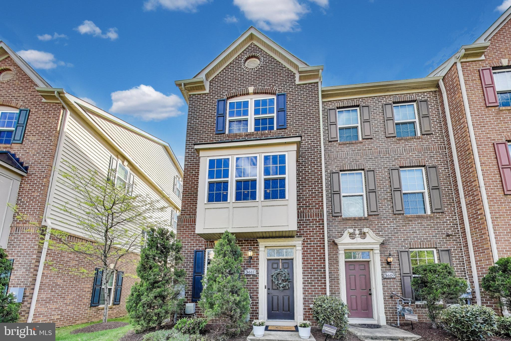 **Urban Chic Townhome in the Heart of Dakota Crossing**

Welcome home to sophisticated urban living in Dakota Crossing! This meticulously maintained end unit townhome offers four fully finished levels, blending space, comfort, and style seamlessly.

Step inside to find elegant hardwood floors that flow effortlessly through each level, creating a warm and inviting atmosphere. The first level is a versatile space, perfect for a guest bedroom or home office, complete with a full en suite bath for added convenience. With direct access to the garage and a utility closet, this level enhances the ease of daily living.

Ascend to the second level, where an open floor plan awaits. The gourmet kitchen is a chef's dream, featuring pristine countertops, stainless steel appliances, a spacious island, and a breakfast bar ideal for casual dining. This inviting space flows effortlessly into the living room, perfect for entertaining, and opens up to a large balcony—ideal for relaxing evenings and outdoor grilling.

The third level offers a flexible space that can adapt to your lifestyle—perfect for a nursery, home gym, or additional office. The third level also features a primary bedroom with an en-suite bathroom, with double sinks.  On the fourth level, retreat to the other spacious primary bedroom, your own private haven, complete with an en suite bath and a generous walk-in closet. Plus, a brand-new washer and dryer are included for your convenience! One year home warranty is also offered.

This home is more than just a dwelling; it’s a lifestyle. Enjoy the nearby community park with green spaces, a playground, gazebo, community pool, and tennis courts at Theodore Hagans Cultural Center. Indulge in retail therapy at the Shops at Dakota Crossing, featuring anchor stores like Lowe's and Costco, along with a variety of dining options.

Conveniently located near Route 50 and NY Ave, this townhome provides easy access to downtown, Ivy City, Union Market, Hyattsville Arts District, and the vibrant H Street Corridor. Plus, public transportation is right at your doorstep, offering a direct route to the Rhode Island metro.

Elevate your urban experience with this exquisite luxury townhome—where modern living meets chic city style!