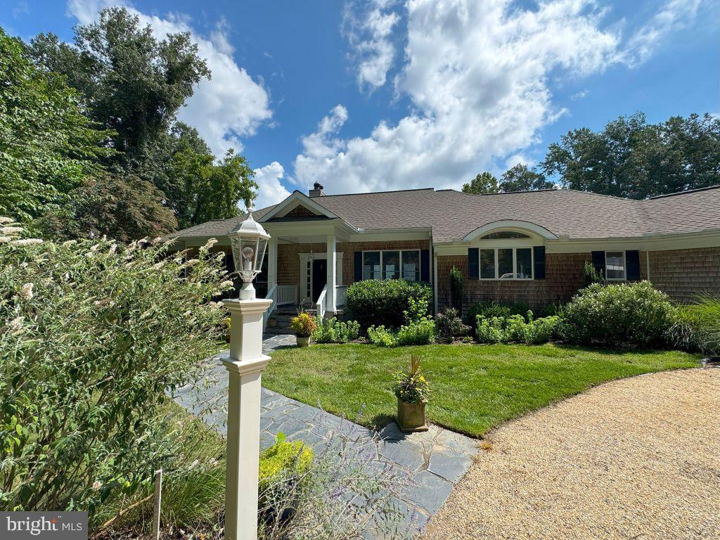 Only one hour from Richmond, this unique, private 8.0-acre property boasts 275 feet of river frontage. The property consists of an elegant, but casual architecturally designed home on an 8-acre lot, the adjacent 8.6-acre lot zoned for a single-family residence is also for sale. The property offers spectacular views of the river. Looking southeast, the view exceeds six miles. The home consists of two levels, the upper level offers a living room, primary bedroom and adjacent bath, gourmet kitchen, laundry room/pantry and a three-car garage. The lower level consists of a Jack and Jill bathroom, two bedrooms and a living room. The living room could be used as a 4th bedroom. Adjacent to the living room is an office. The upper-level living room features a wood burning fireplace with a gas starter,16-foot vaulted ceilings with cypress paneling, heart of pine floors, Tuscan columns and custom cabinetry. Adjacent to the living room is a half bath/powder room. The primary bedroom has 10-foot ceilings, a wood-burning fireplace with a gas starter, a large walk-in closet plus an adjacent bath with soaking tub. The kitchen features a gas stove, double ovens, stainless steel appliances, eat-at island, breakfast nook and 10-foot ceilings. All kitchen appliances were purchased in the last two years. Adjacent to the kitchen is a spacious pantry, laundry room and three car garage.