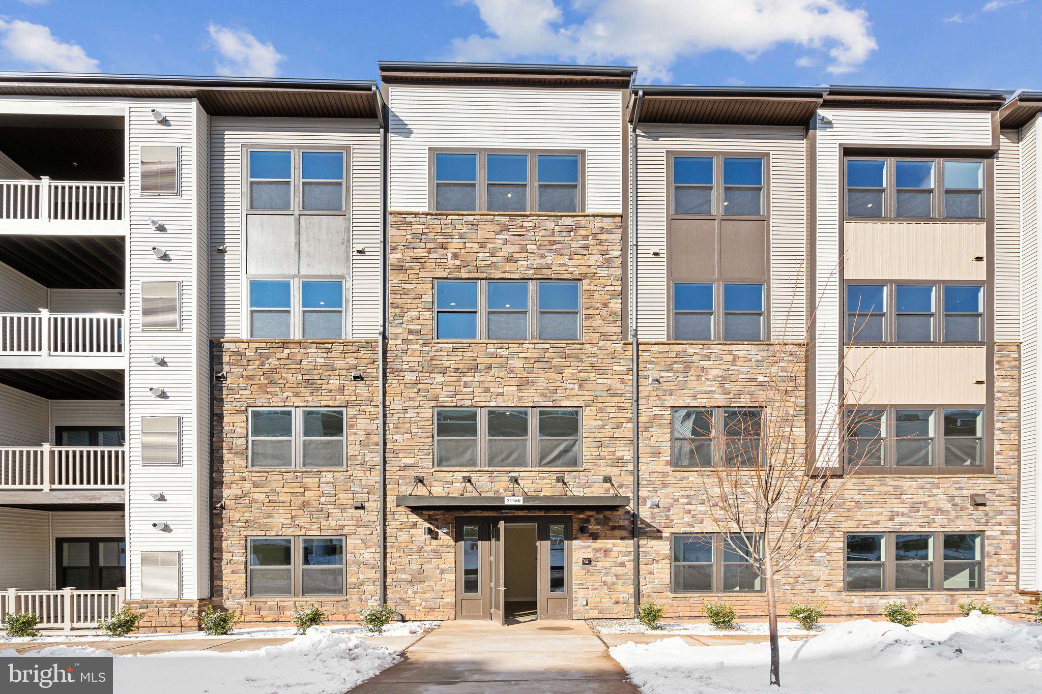 **Brand New 2-Bed, 2-Bath Condo in Prime Sterling Location – Move-In Ready!**

Welcome to 21460 Mount Sterling Terrace #201! This stunning, brand new 2-bedroom, 2-bath condo offers a perfect blend of modern comfort and convenience, located just behind the Sterling Costco and minutes from Tysons Corner. With everything brand new and under warranty, you can enjoy peace of mind and worry-free living.

This spacious, light-filled home features oversized rooms, an open floor plan, and high-end finishes throughout. Both bedrooms are generously sized, with ample closet space, and the bathrooms are sleek and contemporary. The kitchen is equipped with all the latest appliances, perfect for any home chef.

Enjoy the unbeatable location with quick access to major highways, shopping, dining, and entertainment options, all while being tucked away in a quiet and friendly community. 

The unit is vacant, professionally cleaned, and ready for immediate move-in. Don’t miss out on this incredible opportunity for a brand new condo at a great price in a highly sought-after area! 

Schedule your showing today!