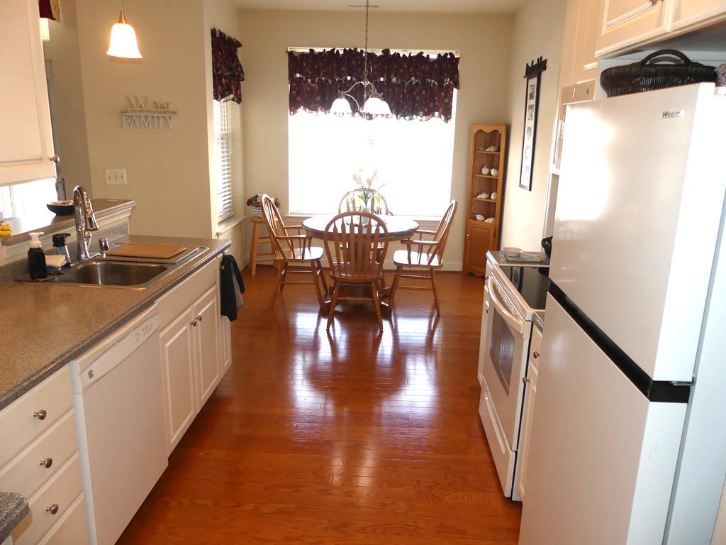BEST VALUE & LOCATION IN ABINGDON. Original Owner has pampered this bright & sunny Bolton 2 w/huge hall storage closet. 1393 sq ft. 2nd flr-Elevator. HVAC replaced 21. Tankless water heater-22. Corian kit w/42" white cab's & hwd flrs. Updated appl's  incl-refrig w/ice maker 26, smooth top stove, b-in micro & dishwasher. 3BD/Flex rm/Office off kit. Crown in Liv/Dine & Foyer. Spacious Liv/Din rm combo w/new slider to balcony. Primary w/full ba & huge w-in closet. Bedrm 2 at opposite end w/full ba & w-in shower. Laundry area in hall w/updated washer & dryer in 2020. 4 ceiling fans. Unit has been very well maintained. 55+ community. Settlement needed end of July. Clubhouse, Pool, Exercise Equipment in Community.
