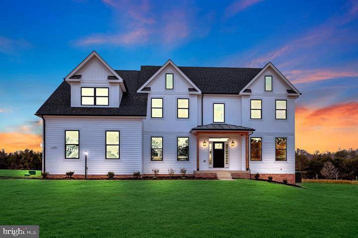 NEW CONSTRUCTION | To Be Built – Modern Farmhouse on 2.61 Acres

Welcome to this stunning to-be-built farmhouse-style home, perfectly sited on a gorgeous 2.61-acre homesite in a prime location—just minutes from everyday conveniences while offering the privacy and space you desire.

Designed with both family living and entertaining in mind, this home features an open and flowing floor plan filled with natural light and upscale finishes throughout.

The heart of the home is the gourmet kitchen, thoughtfully appointed with professional-grade stainless steel appliances, a farmhouse sink, pot filler, granite countertops, and a spacious walk-in pantry. Soft-close cabinetry and drawers add both style and functionality.

The main level includes a private office, expansive great room, and family dining area, all centered around a cozy electric fireplace—creating a warm and inviting atmosphere.

Upstairs, you’ll find four generously sized bedrooms and three full bathrooms, offering ample space for family and guests.

The lower level is designed for versatility and enjoyment, featuring a recreation room with windows and sliding glass door access, a full bath, and a den/flex room—perfect for a home gym, guest suite, or additional office.

Included Features (often upgrades elsewhere):

9' ceilings on main level and basement
Professional stainless steel appliance package (including farmhouse sink & pot filler)
Soft-close kitchen cabinetry and drawers
Oak staircase in foyer
Luxury Vinyl Plank (LVP) flooring on main and upper levels
Electric fireplace
Granite bathroom vanities with undermount sinks
Whole-house humidifier
Black gutters and downspouts
Walkout or areaway basement option
Three-car garage with automatic openers

Backed by a 10-year structural warranty, this home offers peace of mind along with exceptional quality.

Build your dream home from the ground up and personalize your finishes while construction is underway.

Don’t miss this opportunity to own a beautifully crafted home on a spacious homesite in a highly desirable location.