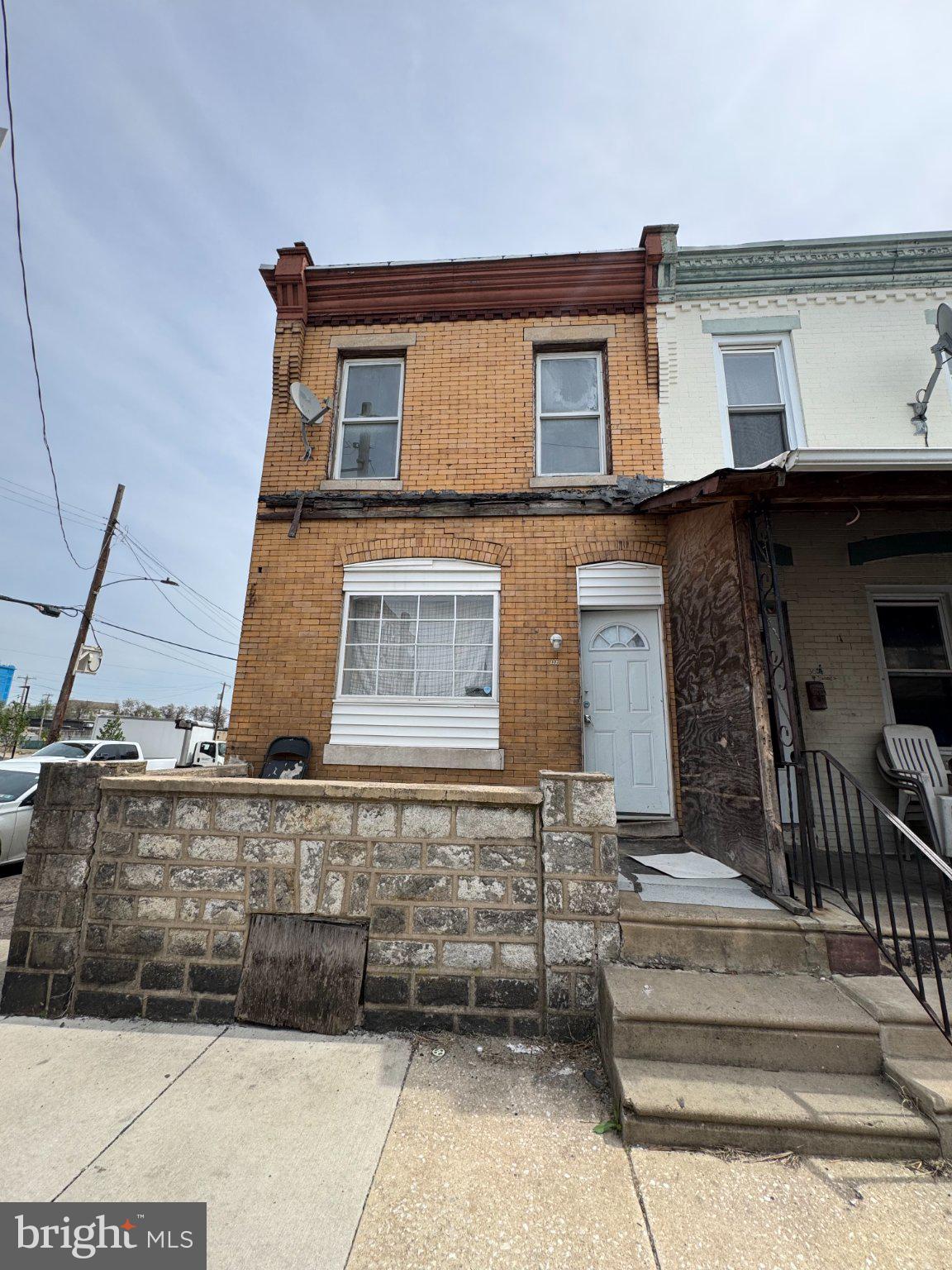 Calling all investors! It's more than halfway completed. Finish the project and discover the charm of this traditional end-of-row townhouse. With 2 bedrooms and a full bathroom, this 813 sq. ft. home offers a perfect blend of comfort and functionality. The full basement provides ample storage or potential for additional living space. The community is well-served by public services, enhancing daily convenience. On-street parking makes access easy for residents and guests alike.
