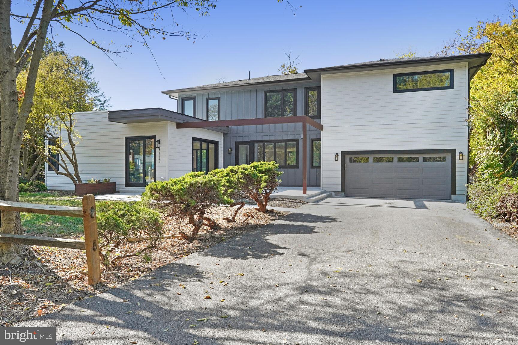 Welcome to this new Alexandria residence boasting 9-foot ceilings, engineered hardwood floors, premium spray foam insulation, and sleek aluminum windows and doors. With over 3,900 square feet of living area, this home includes 6 bedrooms and 4.5 bathrooms. At the heart of the home, a fully customized kitchen features a convenient walk-in pantry and an accordion window opening to the patio, seamlessly blending indoor and outdoor living. Entertaining is effortless in the formal dining and living rooms, where you can easily host large gatherings and family events - it's all bright and open with access to multiple outdoor patios through three oversized sliding doors. The 15-by-20-foot covered side patio is perfect for al fresco dining and relaxation. The first level is rounded out by an elegant powder room by the front entrance of the house, and  a guest bedroom/office space with a full bathroom at the opposite end, perfect for privacy. Upstairs finds 5 more bedrooms and 3 bathrooms, including the private oasis that is the master suite. With a luxurious en-suite bathroom and 2 generous walk-in closets, this gorgeous space is truly a sanctuary. The home also includes a two-car garage, two mudrooms for organization, and an ideal location close to major roads like Rte 7, Seminary Rd, and I-395. Commuters will appreciate convenient access to Arlington, Alexandria, Reagan National Airport, and the Pentagon shuttle. Located near Dowden Terrace Park, this home offers a great combination of nature and urban convenience.