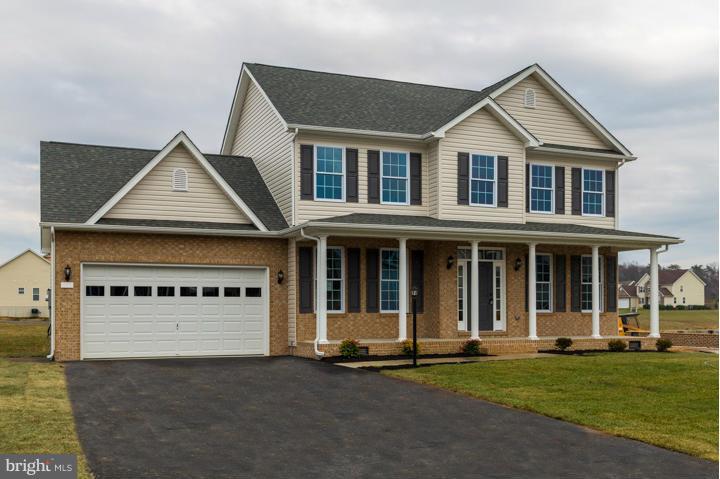 This 4 bedroom 2 1/2 bath  home is located in a well maintained and sought out Webber Springs subdivision. Move in ready! It features crown molding, hard wood floors and granite counter top. Come see this well constructed home today!