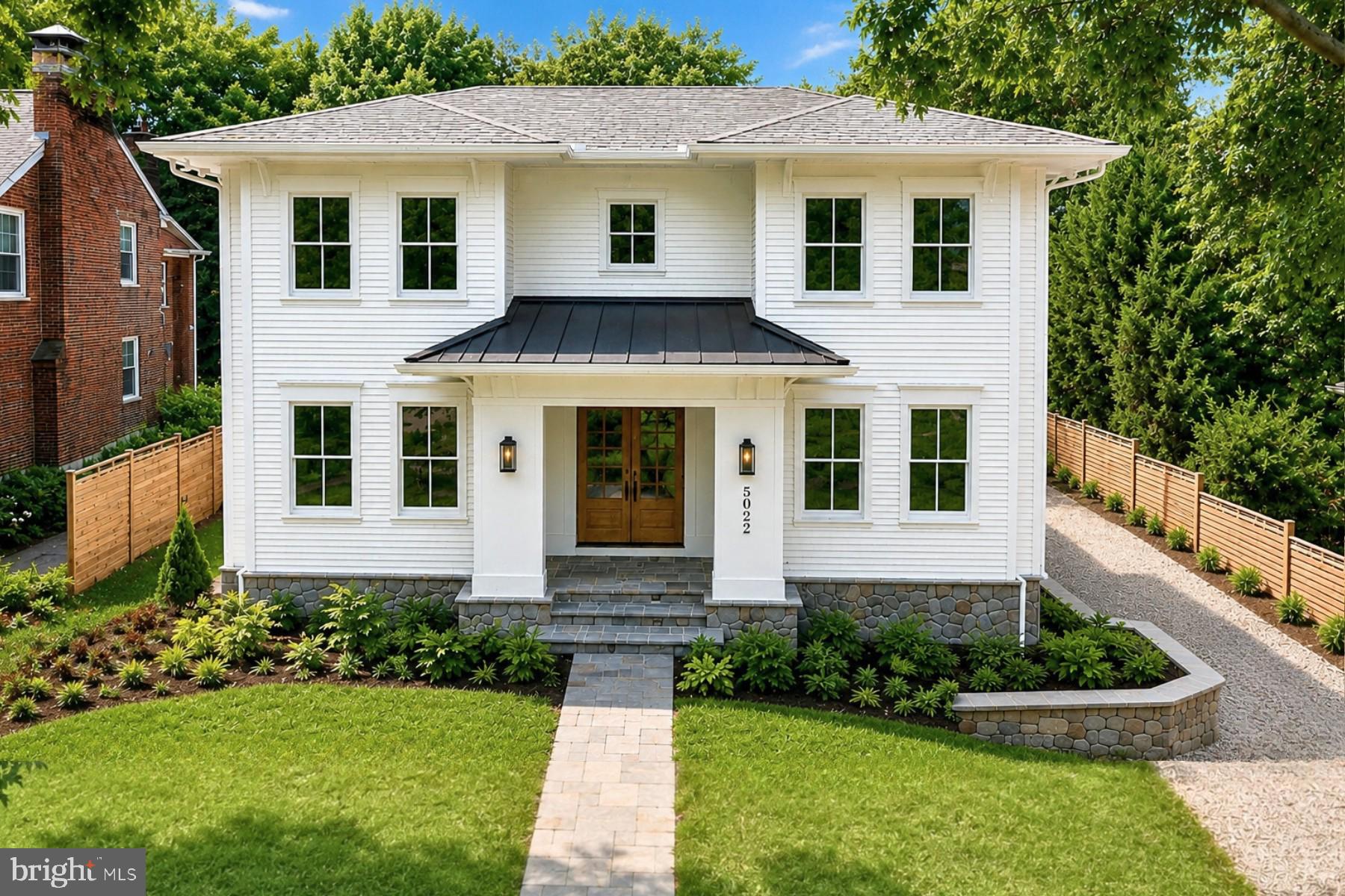 New Price! An extraordinary offering in the prestigious Kent/Palisades neighborhood of Washington, DC, this newly constructed residence by CIMA Design + Build masterfully blends the timeless appeal of a classic four-square floor plan with modern luxury. Now offered at a new price, this exceptional home spans more than 5,600 square feet and delivers refined living with impeccable craftsmanship, sophisticated finishes, and thoughtfully designed spaces for both grand entertaining and everyday comfort.

A gracious entry welcomes you into light-filled interiors featuring soaring 10-foot ceilings, wide-plank white oak hardwood floors, custom designer millwork, and an elegant open-concept floor plan. Every detail has been carefully curated to create an atmosphere of understated luxury.

At the heart of the home, the chef's kitchen is both stunning and functional, showcasing premium Thermador appliances, a dramatic waterfall island, and a fully appointed butler's pantry complete with a second dishwasher ideal for effortless entertaining. Integrated whole-home audio enhances every gathering and everyday moment.

The upper level is anchored by a luxurious primary suite offering heated bathroom floors, dual custom walk-in closets, and a spa-inspired bath featuring a skylit soaking tub. Three additional spacious en-suite bedrooms and a conveniently located laundry room complete this level.

Designed with exceptional versatility, the expansive lower level features impressive 9-foot ceilings, two additional bedrooms, a stylish wet bar with beverage refrigerator, and direct walkout access to the backyard, providing the perfect space for guests, recreation, or multigenerational living.

The professionally landscaped outdoor living areas are equally impressive, highlighted by a spacious patio, built-in grilling station, and integrated speakers that create an ideal setting for outdoor entertaining and al fresco dining.

Additional features include an oversized attached two-car garage with EV charging readiness, a custom mudroom with built-in storage, CAT6 wiring, a comprehensive security system, fire sprinkler system, and abundant storage throughout.

Ideally located just minutes from Georgetown, Downtown Washington, McLean, Arlington, and Bethesda, this exceptional residence also offers easy access to boutique shopping, acclaimed dining, and the scenic trails of the Chesapeake & Ohio Canal, delivering an unparalleled combination of luxury, convenience, and lifestyle.