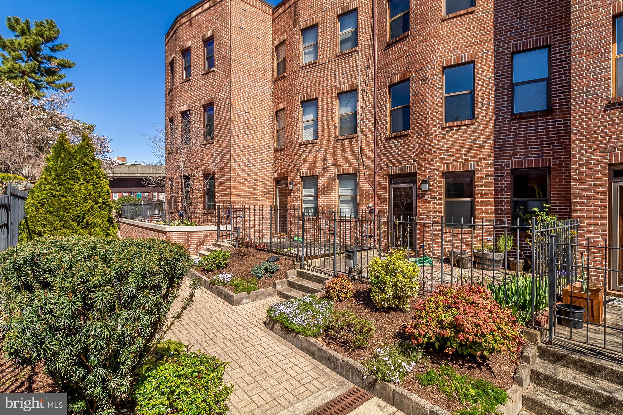OPEN HOUSE! Sunday, April 7th from 11 am to 1 pm. Welcome to your dream home in the prestigious gated community of Mt. Vernon Mews! This stunning 2 bedroom, 2 bathroom residence offers the perfect blend of modern luxury and classic charm.

As you step inside, you'll be greeted by a warm and inviting living room featuring a cozy wood-burning fireplace, perfect for chilly evenings and intimate gatherings. The recently renovated kitchen is a chef's delight, boasting elegant white cabinets, sleek granite countertops, stainless steel appliances, and a convenient breakfast bar for casual dining.

The spacious eating area is ideal for meals or entertaining guests. Both bathrooms have been completely renovated with modern fixtures and stylish finishes.

Upstairs, you'll find the expansive primary bedroom, complete with its own laundry area for added convenience. Step outside to the front paver patio, where you can relax and enjoy the beautiful surroundings of this tranquil community.

Located in the heart of the Mt. Vernon area, this home offers easy access to top-notch amenities and attractions. Close proximity to Hopkins and the University of Maryland makes it ideal for students and professionals alike, while the nearby farmers market provides fresh produce and artisanal goods within walking distance!

Don't miss out on this exceptional opportunity to own a piece of Mt. Vernon paradise. Schedule your showing today and make this exquisite home yours!