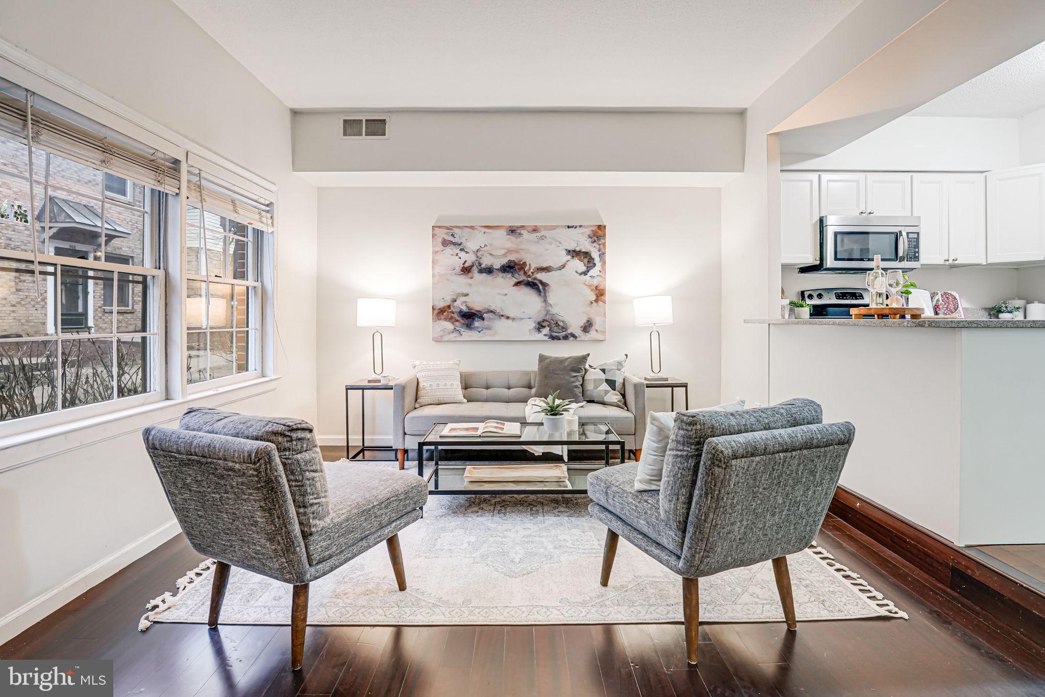 Welcome to The Bedford Bliss, a charming 1-bedroom, 1-bathroom condo with its own private entrance, offering a townhouse-like feel in the peaceful Bedford Park community. This ground-level home features low-maintenance flooring throughout, a bright and open living area, and a kitchen with ample cabinet and counter space for easy everyday living. The bathroom includes classic tile finishes, and in-unit laundry adds convenience. With a private entryway and direct access to the community’s green space, this condo blends comfort, privacy, and practicality. Ideally located within walking distance to Clarendon Metro, you’ll enjoy easy access to top restaurants, shopping, and entertainment. Off-street parking for 2 vehicles is included, and with quick access to Route 50 and I-395, commuting into DC or around Northern Virginia couldn’t be easier. Whether you’re a first-time homebuyer or seeking a low-maintenance Arlington home, The Bedford Bliss offers an unbeatable combination of location and lifestyle.