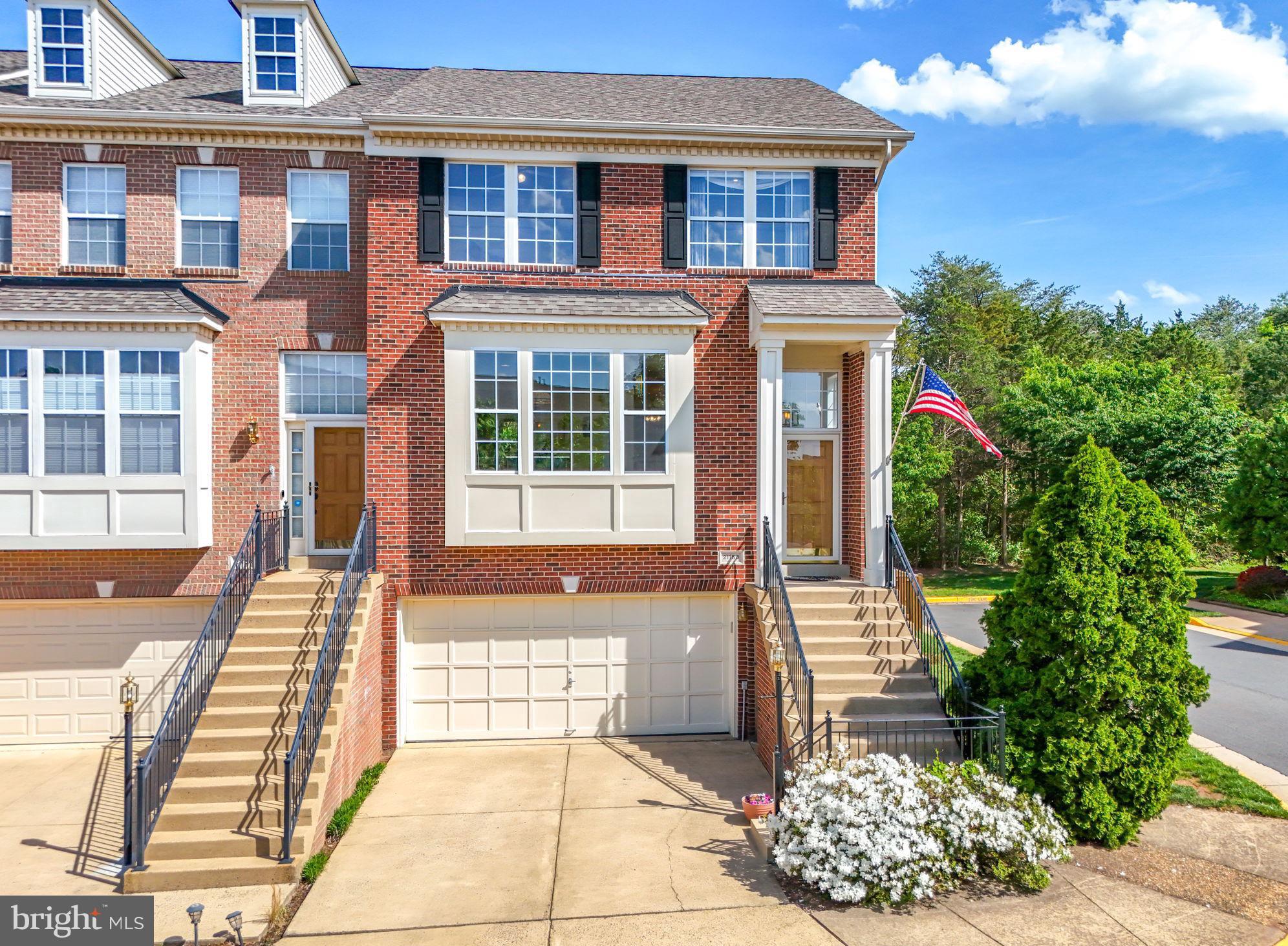 WELCOME to this impressive 2 car garage, end unit townhome near Dulles Town Center!  This home includes 4 spacious bedrooms, 3 full bathrooms and a powder room.  Natural light floods this 3 level home and you will absolutely fall in love with the screened porch, deck, patio and fenced backyard... all backing to woods, peaceful and relaxing, adding outside living space to the property!  Many upgrades to include a new roof in 2019 and a new HVAC system in 2018.  Beautiful hardwood floors flow through the main level.  The home has 2 gas fireplaces - one in the living room and one in the lower level family room.  The 2 car garage is oversized with a workshop area and additional storage closet.  Don't miss the storage space under the outside entrance stairs!  This HOME has been meticulously cared for and is ready for a new owner to call it HOME!