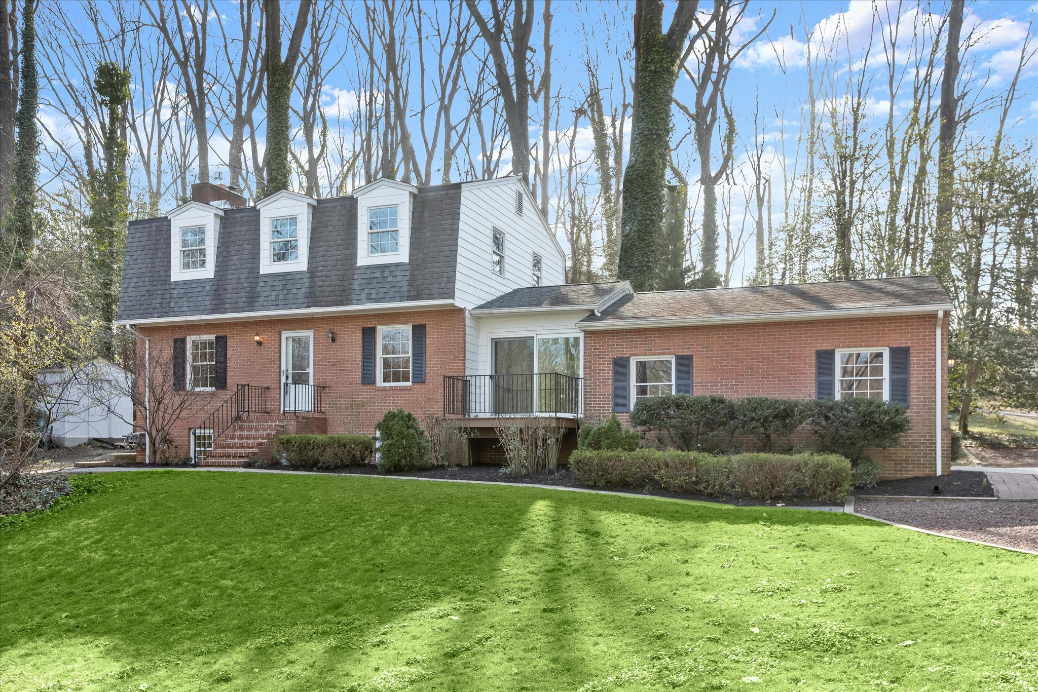 Perched atop the hill as you enter the North Shore on the Magothy community, this stately Dutch Colonial welcomes you. This 4-bedroom, 2.5-bath home offers room to spread out, settle in, and make it your own.

With approximately 2,200 square feet of living space, you’ll find hardwood flooring, a cozy fireplace, and a partially finished lower level that adapts easily to a variety of needs—whether work, recreation, or additional living space.

This home has been consistently cared for and thoughtfully updated over time. Recent improvements include a new water heater (2026), twin water softener system and expansion tank (2024), insulated garage door and opener (2024), and a new dishwasher (2024). The kitchen has also been refreshed with updated flooring and a newer refrigerator, while sliding doors in the breezeway (2020) add both function and charm.

Major exterior upgrades include architectural shingle roofing, Hardiplank siding, Andersen Low-E windows, and a replaced concrete driveway. Front and rear decks offer great options for everyday use or entertaining.

The oversized garage is a standout feature, offering high ceilings and ample width and depth to accommodate two vehicles along with additional space for storage or a workbench.

Step outside to enjoy a generous yard with room for outdoor living, recreation, or future projects.

All of this is set in a Pasadena location with access to local amenities, commuter routes, and nearby waterfront destinations. A home that blends space, updates, and opportunity—ready for its next chapter.