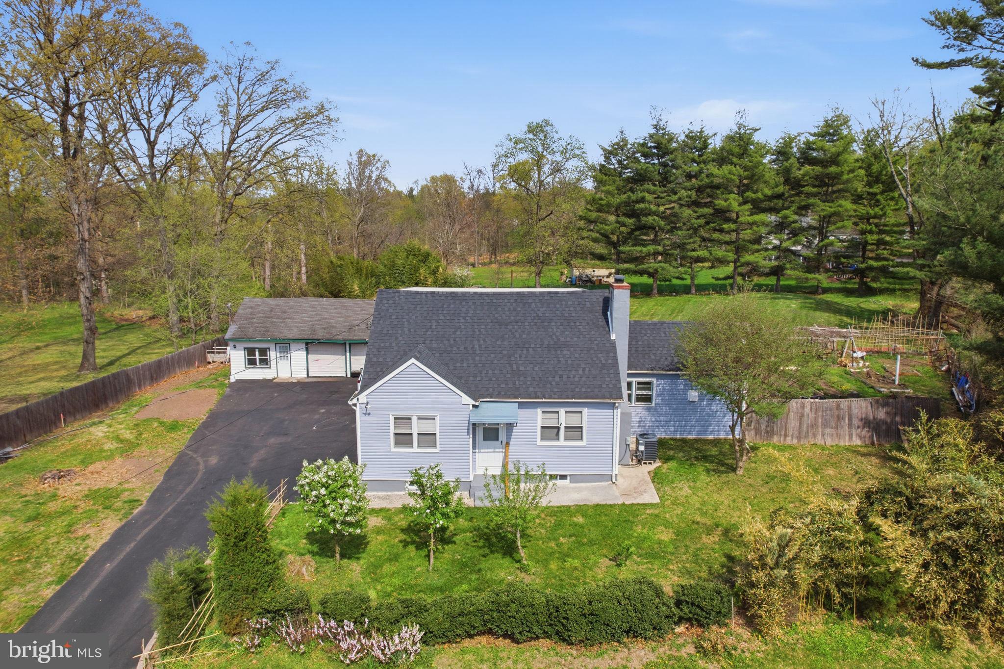 Completely updated home on an incredible lot in a convenient location ideally situated between downtown Newtown and New Hope. Newer roof, siding, windows, updated kitchen, new recessed lighting, renovated bathrooms, newer HVAC and newer septic make this a great value for a turnkey residence. A large deck overlooks the expansive, private yard. Park extra vehicles in the widened driveway, fantastic storage in the detached garage, finished walk-up lower level and multiple sheds on the property. Convenient to all of the shopping and dining and major roadways for commuting all within the highly coveted Council Rock schools.