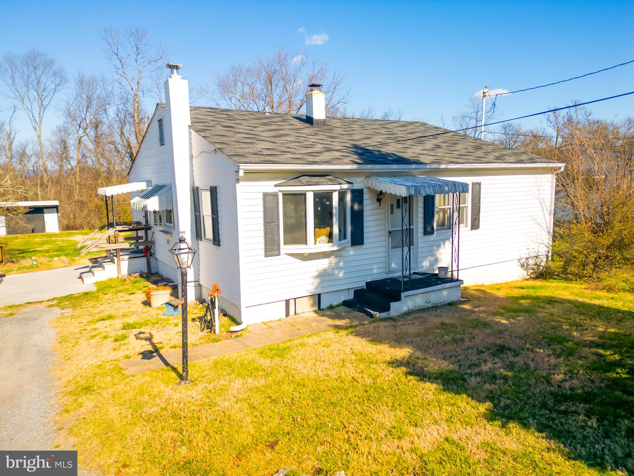 *Motivated Sellers* Enjoy same level living in this home.  Including a dinning room and a laundry/storage room. The large grassy back yard is a nice space to plant some crops, toss the ball around, or have the pets run and play. The large outbuilding/shed is useful for any additional storage needs. The circular driveway is a convenient feature for you or your guest. Roof replaced in 2019.