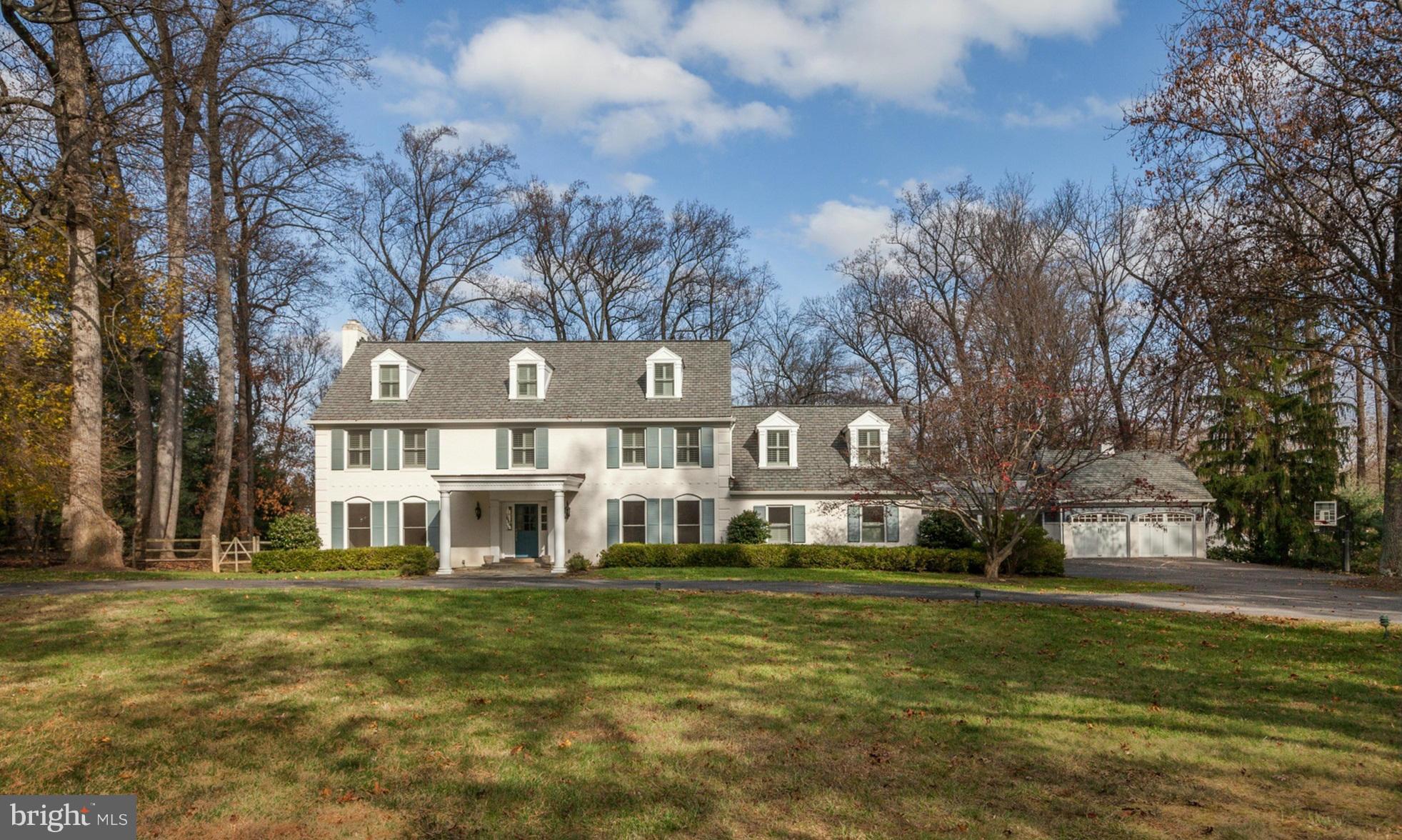 Special home in Potomac Falls, almost entirely re-built in 2007. Freshly painted, gleaming hardwood floors, gourmet kitchen, first floor bedroom and bath, 4 finished levels, master bedroom/sitting rm, large wine cellar, circular driveway with 4 car attached garages. The outside is special with large pool, separate screen porch, office and lots of trees. HOME ON PUBLIC WATER AND SEWER!!.
