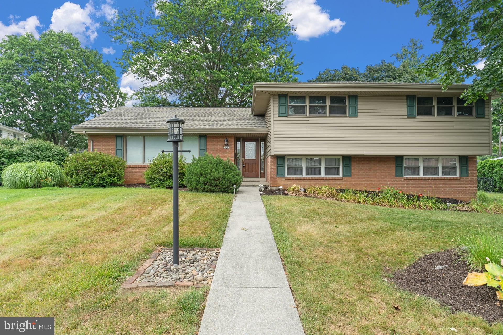 Welcome to this well-maintained split-level home in an exceptionally convenient North Londonderry location, just a short walk to the high school and public pool. Situated on a quiet street, this single-family home offers quality construction, mature landscaping, and a wonderful fenced backyard featuring a spacious paver patio—perfect for relaxing, entertaining, or enjoying the outdoors.

Inside, the main level showcases luxury vinyl plank flooring throughout, a spacious living room filled with natural light and equipped with remote-controlled blinds, a formal dining room, and a kitchen with stainless steel appliances and a cozy dining area.

Upstairs, you'll find four comfortable bedrooms and two full bathrooms. Just a few steps down from the main level is a flexible living space that could serve as a fifth bedroom, home office, or guest room, along with a convenient half bath and laundry area.

The finished lower level provides an inviting family room complete with a bar area and a propane gas fireplace, creating the perfect space for gatherings. An unfinished storage room offers plenty of additional storage space.

Recent updates include a new roof installed in June 2026 and Pella windows throughout the home, adding to its long-term value and efficiency.

Offering generous living space, thoughtful updates, and an unbeatable location close to schools, recreation, and everyday conveniences, this is a home you won't want to miss.