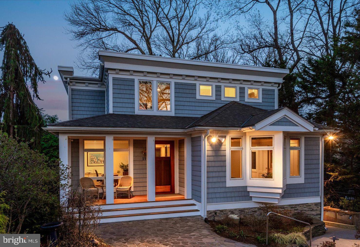 Experience the best of waterfront living with easy water access to historic Annapolis, Eastport, and the Chesapeake Bay. Perfectly sited in a protected area on Spa Creek, this eco-friendly contemporary home was designed by architect Gary S. Schwerzler of Fourth Street Design Studio and built by Blueford Contracting. Set on a quarter of an acre and surrounded by lush native landscaping, the property features three east-facing decks, a private pier with water and electric, two boat slips (16' x 40' and 10' x 20'), and a dual kayak dock. Mean low water is over six feet in the larger slip and five feet in the smaller. A piling permit is secured for the narrower slip. Designed to maximize natural light and views of water, woodlands and wildlife,  the home showcases exceptional craftsmanship throughout. A welcoming front porch leads to an oversized walnut entry door and spacious foyer. The main level includes a bedroom with en-suite bath, a home office with built-ins, open-concept living and dining areas, and a modern kitchen with high-end appliances, Corian and granite counters, and a walk-in pantry. Upstairs are two additional en-suite bedrooms, laundry, and a storage room. The waterside primary suite offers its own private deck and a generous walk-in closet. The home has numerous high-end finishes including Hubbardton Forge lighting, heated bathroom floors, extensive custom built-ins, solid-core pocket doors, Brazilian teak floors, and custom interior railings fabricated by M Yacht Services. The walk-out lower level, original to the 1940s cottage, provides ample storage for boating equipment, a workshop, a second laundry, and a flexible finished space ideal for a gym or recreation room. It opens to a patio, a rustic summer kitchen, a half bath, and an inviting outdoor entertaining area—perfect for gatherings and classic Maryland crab feasts. Constructed for visual appeal, durability, and efficiency, the home features IPE decking, Nichiha fiber cement siding, AZEK trim, Marvin windows and doors, geothermal HVAC, tankless hot water, a Honda generator, and a propane fire pit. Ample parking for four vehicles in front.  Enjoy the best of both worlds - being on the water, surrounded by nature and wildlife - while also having footpath and water access to parklands and town.