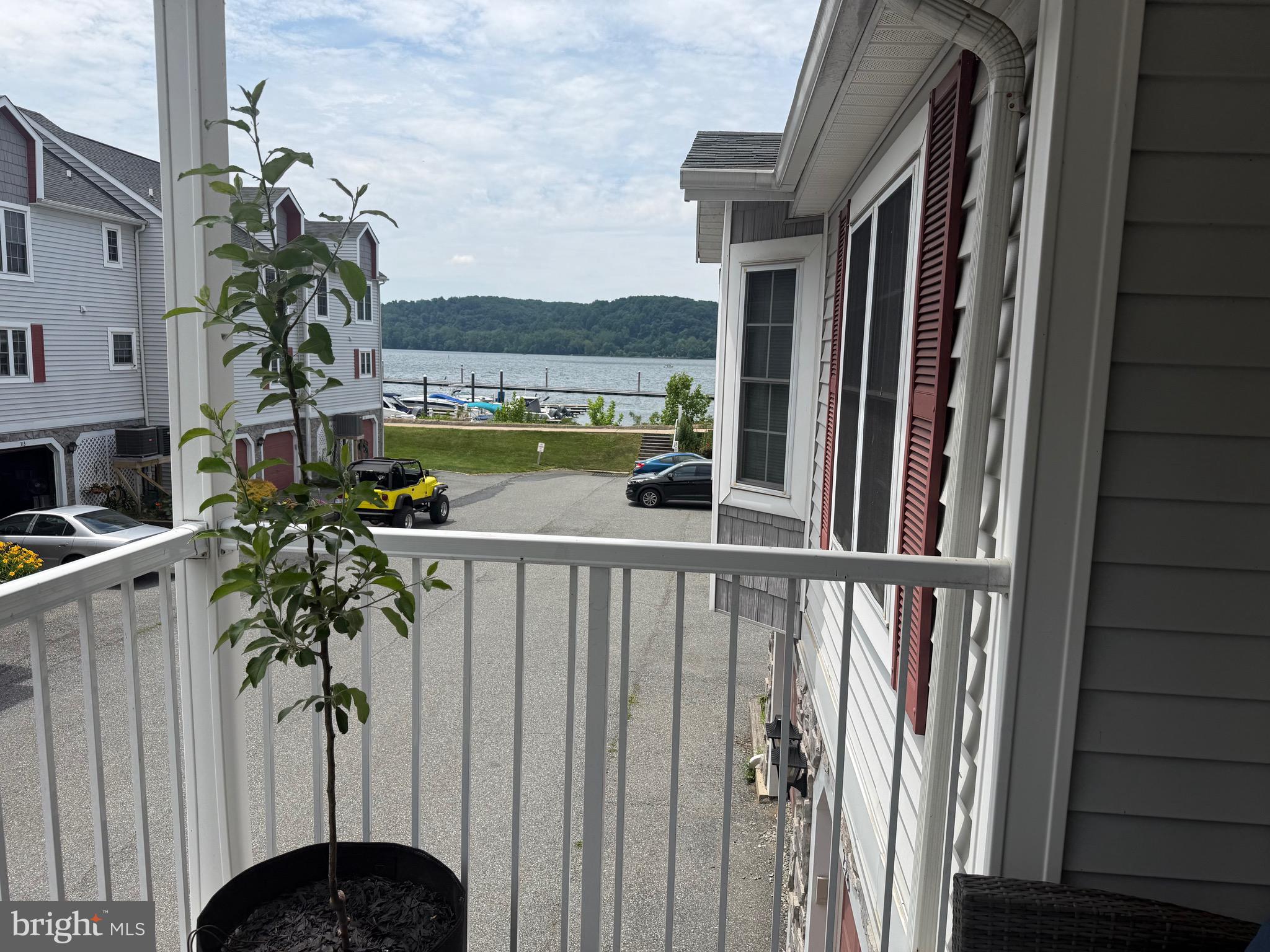 **PROFESSIONAL PHOTOS BEING TAKEN ON 6/16. WILL GO ACTIVE RIGHT AFTER PHOTOS ARE TAKEN**
Vacation where you live in this meticulously maintained 2 bed, 2 bath condo in the waterfront community of Tomes Landing! Kitchen is open to the large living room and has sliders to side balcony. Both bedrooms are quite large including an owner's suite that also has sliders to the balcony where you will find great water views!  Washer and dryer are included in the unit as well as a very large pantry and storage. 1 car garage and a pool membership that's included in your condo fees. Walking distance to a few outstanding restaurants nearby where you'll find excellent food and entertainment! Close to marina and boat ramps. Minutes to 95 and Rte 40! Right in between Philly and Baltimore for an easy commute.
