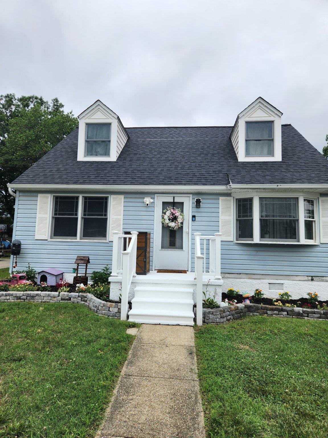 Nestled in the charming Glenwood neighborhood, this Cape Cod-style home offers a perfect blend of comfort and functionality. With 1,260 square feet of living space this residence features four bedrooms and two full bathrooms. Step inside to discover a warm and welcoming atmosphere, highlighted by an eat-in kitchen equipped with modern appliances, including a gas oven/range, built-in microwave. The kitchen flows seamlessly into the living areas, making it ideal for gatherings. Enjoy the convenience of a main-level bedroom and a bathroom featuring a tub shower and a front load washer and dryer. The exterior boasts low-maintenance vinyl siding and a well-maintained yard with beautiful landscaping, perfect for outdoor enjoyment. A spacious deck invites you to unwind while overlooking the backyard, and a secure storage shed provides additional space for your outdoor equipment. The asphalt driveway offers off-street parking, ensuring easy access for you and your guests. The roof is new with architecual shingles.  This conveniently located community is just a stone's throw away from easy access roads, shops, and dining options, making it an ideal spot for those who appreciate convenience and a sense of community. Experience the warmth and charm of this Glenwood gem-your new home awaits!