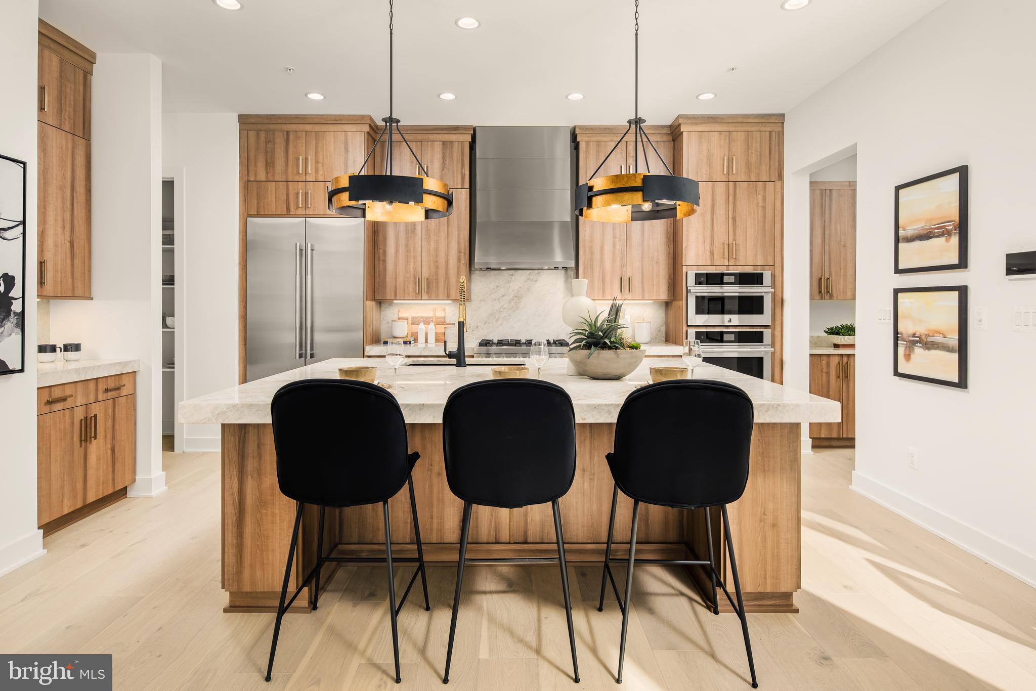 Don’t miss out on a chance to purchase a beautifully decorated model home in Bethesda’s newest single-family community, Amalyn, built by America’s Luxury Home Builder – Toll Brothers! The Florin contemporary offers an open concept main level with flex space off the front door. The dining room features a large dining table with 8 place settings which walks out to the luxury outdoor space perfect for entertaining or enjoying your morning coffee. The kitchen boasts stacked cabinets to the ceiling, striking 3” quartzite countertops with large center island. The great room is perfect for a family movie night with the 42” Cosmo fireplace. Enjoy even more entertainment space from the casual dining area with a deck equipped with a built-in grill and patio. The second-floor boats a spacious primary bedroom and bath with expansive shower and free-standing tub with dual vanities and private water closet. The loft is ideally situated between the secondary bedrooms and steps away from the rooftop terrace. The basement brings more opportunity for entertainment and a retreat for guests with the bedroom and full bath. Learn more about this unique opportunity to own our Florin model home at Amalyn!