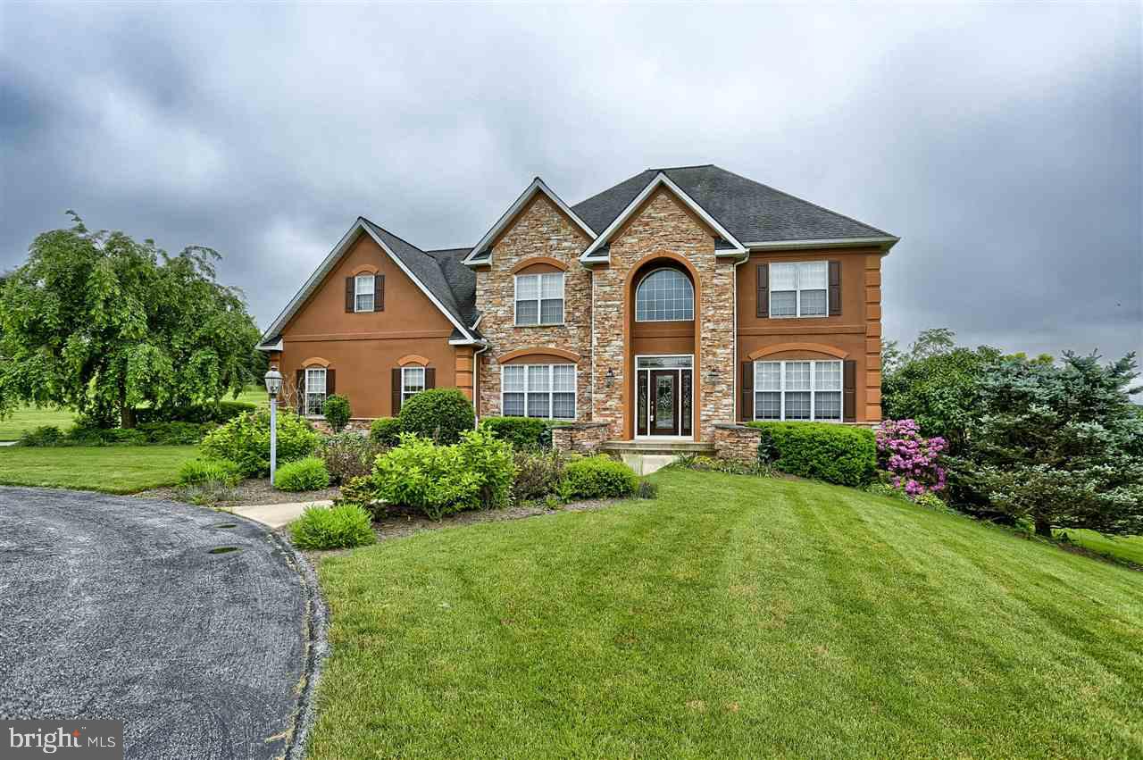 One of a kind Stone & Dryvit 4,170 sq ft colonial-over 10 Acres rolling equestrian. Huge kit w/gigantic solid surface isld, sunk LR, hrdwd flrs, sep DR, huge great rm w/vaulted ceilings, front & rear stairs to 2nd & bsmt, in-pool w/slide, pavilion & hot tub. Main free fence & bldg for horses, stone wood burn frplc, custom built ins, pro landscape, clean & green!