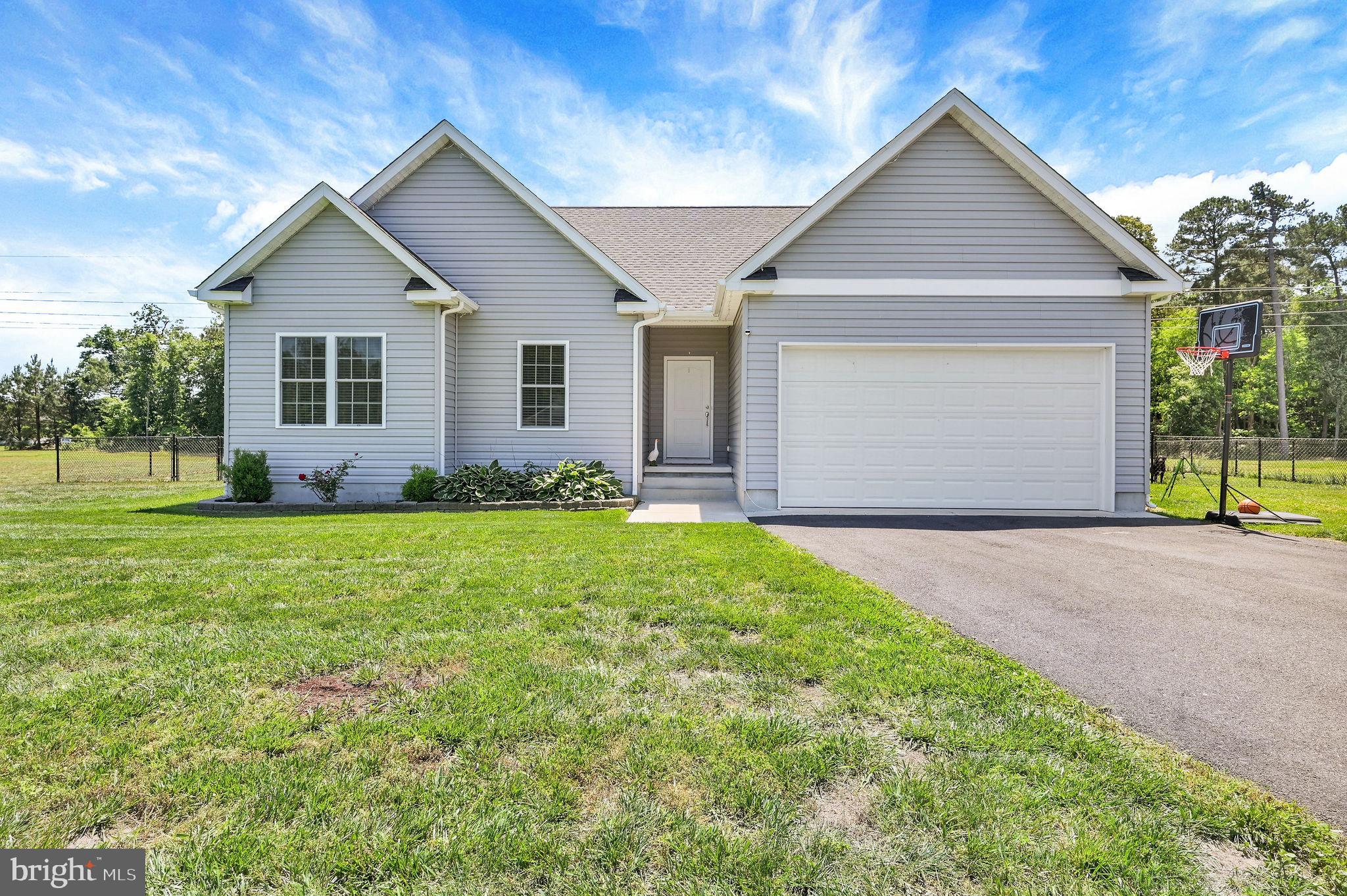 Built in 2022, Newer construction means less to worry about and a truly move in experience. Beautifully maintained 3-bedroom, 2 bath home offering easy one floor living in a peaceful neighborhood setting. The open concept layout is perfect for everyday living and entertaining. Situated on nearly an acre, this property features a fenced yard extra parking for a boat or RV and plenty of outdoor space to enjoy. Move in ready and conveniently located within the sought after Cape School District. This home combines comfort, convenience and quiet country living.