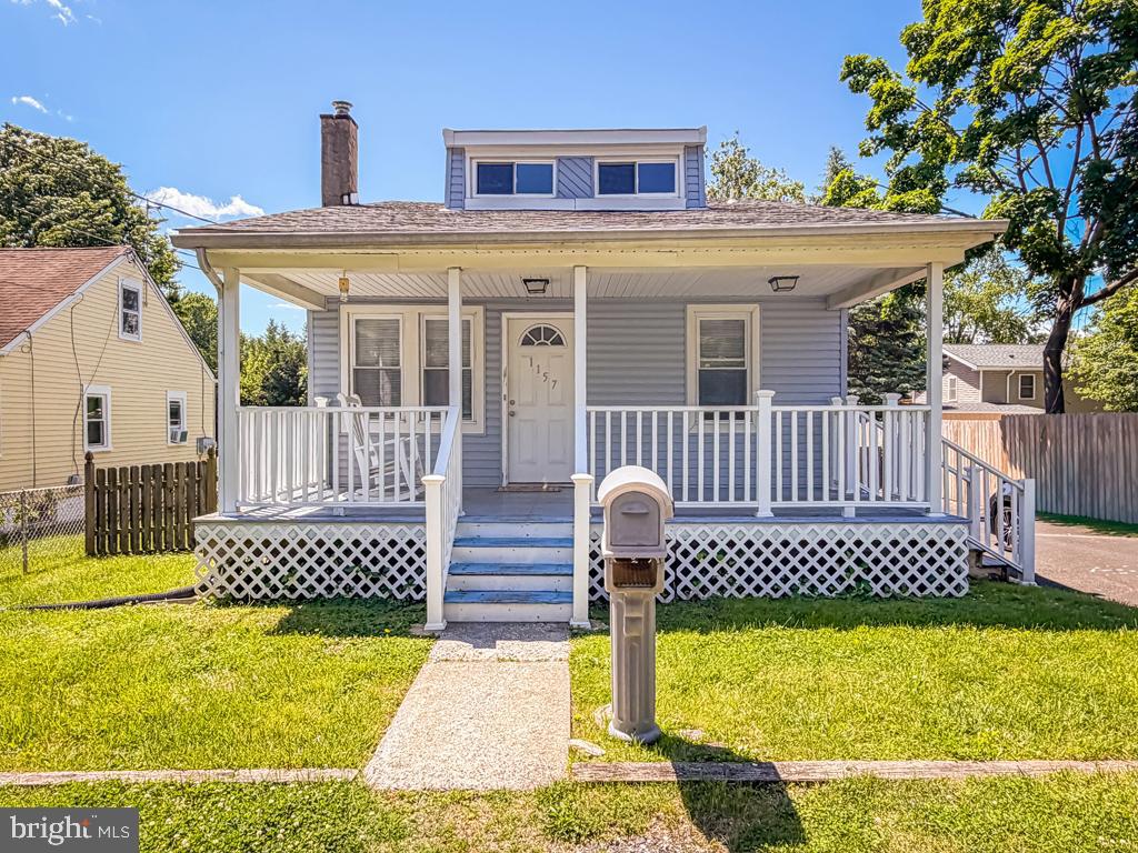 Neshaminy Falls cape style home for sale on a quiet street in the Neshaminy School District. Relax in the morning with your coffee or enjoy the afternoon sun on the large covered front porch. The first floor consists of 2 bedrooms, a hall bathroom, kitchen with plenty of cabinet space, and a sunroom that can be a dining room or home office. Sunroom has access to the fenced in back yard that is great for those weekend family gatherings. A Large master bedroom is on the second floor with large closets, storage space and a half bath. If you don't need a bedroom on the second floor, this will also make a great family room/game room. 50 gal hot water tank (3yrs old), Heater (5yrs old) and 100-amp electric service. Unfinished basement with laundry area with double laundry tubs. Laundry hook up is also in kitchen. Large driveway for 3+ cars.