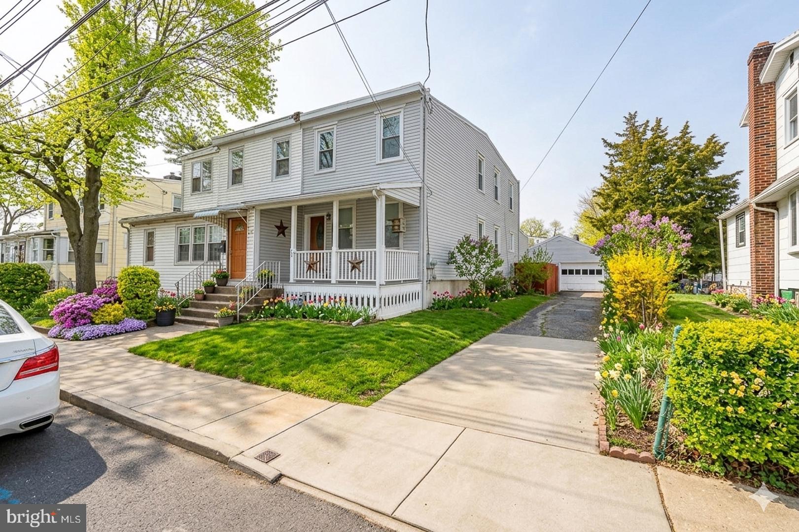 Welcome to 216 Ridley Ave — a move-in ready, two-story twin that delivers style, function, and value in one standout package! From the charming covered front porch and manicured landscaping to the gleaming hardwood floors throughout, this home impresses at every turn. The open first floor features recessed lighting, a cozy gas fireplace with tile surround, and a show-stopping kitchen with white shaker cabinets, granite countertops, a center island, subway tile backsplash, and a full suite of stainless appliances. A first-floor full bath and spacious laundry/mud room with rear access add everyday convenience you'll use and love. Upstairs offers three comfortable bedrooms with good closet space and a beautifully tiled full bath. Out back, enjoy a detached garage and private driveway — a rare find at this price! Located steps from the SEPTA Sharon Hill Line for a direct ride to Center City, with easy access to I-95, Philadelphia Int'l Airport, and all major routes. This is the one you've been waiting for — schedule your showing today!