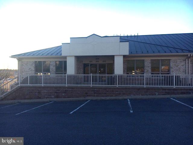 Well maintained Class A Building with Masonry and Stucco Architectural Design. Center consists of 30,400sf of Professional, Medical and service oriented Tenants with plenty of parking, full ADA accessibility. Property has great exposure from its higher elevation above Rt #55 and ease of access from its multi-tiered parking, which creates storefronts at grade. Well positioned and well managed property built in 2004 with 100 residential roof tops directly behind the center. The property has a great mix of tenants, which range from  Child care, IT Office, Barber,  including several  Health Counseling Services.   . Landlord would entertain all types of Commercial uses such as; Restaurant, Retail, Salons, Consignment/Thrift Shop, Antique Shop, Medical, Health Care services Kids Amusement, Fitness, Churches and other Community service businesses.. Space available; 800sf, Suite 201 is 800sf, offered at $10.00psf or $1,099.41 monthly, which includes; electric, gas, water and sewer are included in the lease as part of  CAM. Suite 110 is 2,400sf at $7.00psf NN or $1,806.52. . Suite #120 is 4,600sf at $7.00psf NN or $3,462.18 monthly, Tenant is responsible for Electric and gas in the larger in line spaces. Call today to set up a tour the Business Center