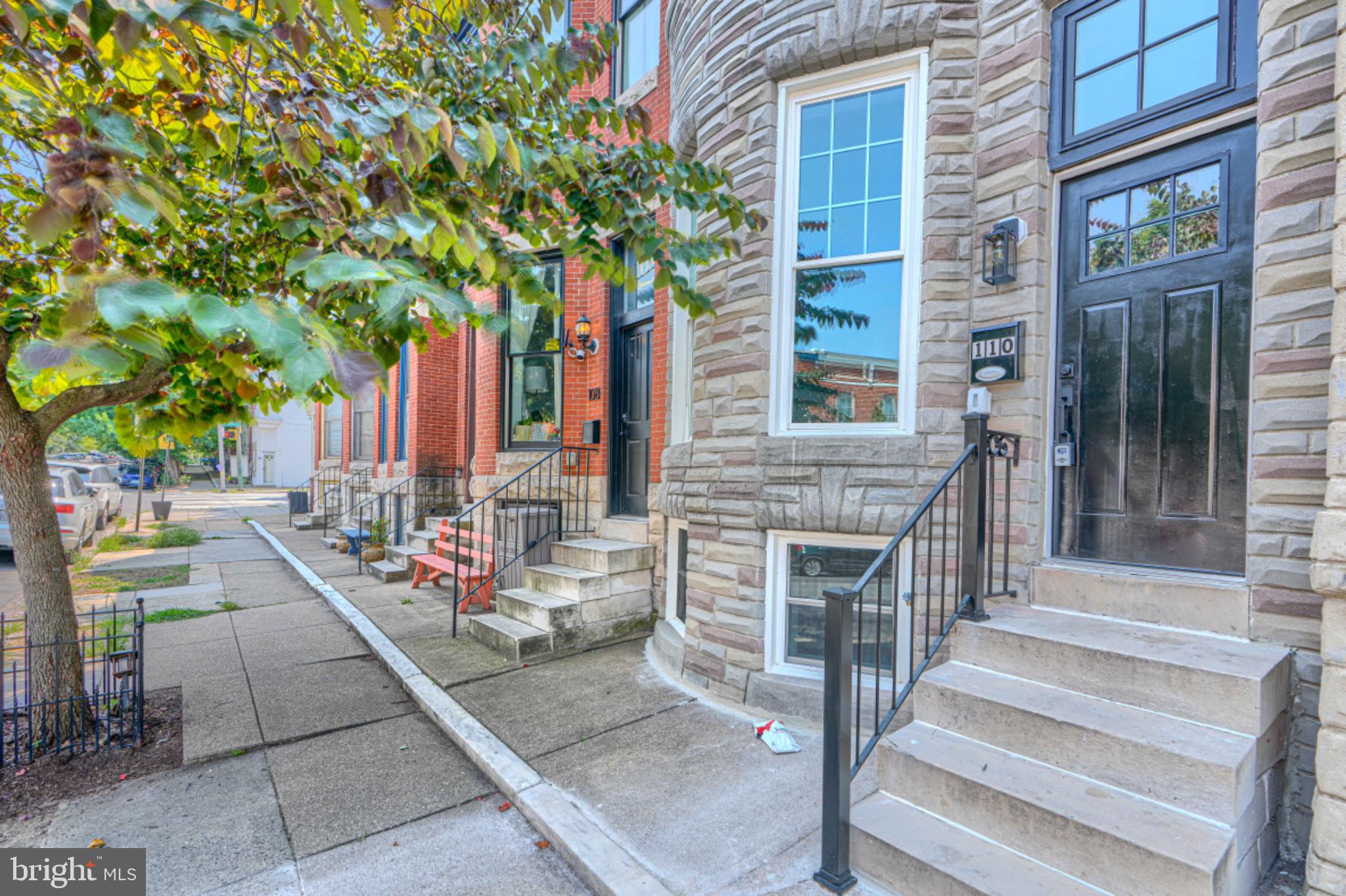 AGENTS - PLEASE VIEW AGENT REMARKS IN BRIGHT MLS. Location, Location, Location--Welcome to 110 N. Lakewood Avenue, where classic Baltimore charm meets the comfort and peace of mind of a complete renovation, with OFF-STREET PARKING!! Located just one block from Patterson Park, this home gives you the best of city living with one of Baltimore's most sought-after parks practically at your doorstep. Every part of this home has been thoughtfully updated from top to bottom. Inside, you'll find three spacious bedrooms, three full bathrooms, and a convenient first-floor powder room. The open main level features new flooring, recessed lighting, high ceilings, and a warm exposed brick accent wall that adds character while preserving the home's historic feel. The kitchen is finished with new quartz countertops, stainless steel appliances, and plenty of space to cook, gather, and entertain. Upstairs, the bedrooms and bathrooms have been beautifully finished with today's buyer in mind. Downstairs, the fully finished basement offers two separate living areas and a full bathroom, making it an ideal space for a family room, home office, guest suite, workout room, or additional entertainment space. Behind the walls, you'll appreciate the updates you can't always see but will certainly value: new heating and air conditioning, new plumbing, new electrical, and quality renovations throughout, giving you confidence for years to come. One of the biggest bonuses is the private off-street parking pad in the rear—a feature that's hard to find and incredibly valuable in the city. Whether you're taking a morning walk through Patterson Park, enjoying nearby restaurants and coffee shops, or commuting downtown, this location puts everything within easy reach. Homes this close to Patterson Park that have been renovated extensively don't come along often. If you've been waiting for a move-in-ready home that combines modern updates, timeless character, and unbeatable location, this is one you won't want to miss. 

Offers may be entered ONLINE through Monday, August 3, 2026 at 4:00 pm.

AT SELLER'S DISCRETION, AN OFFER MAY BE ACCEPTED AT ANY TIME.