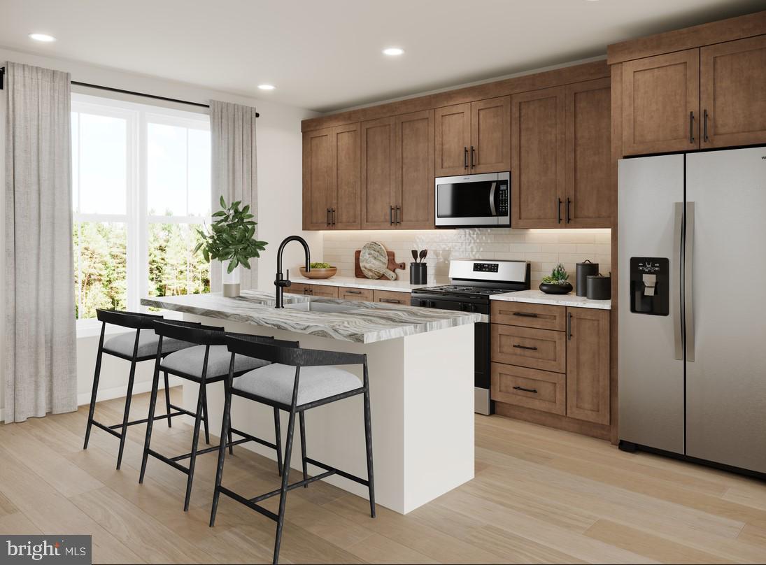 Welcome to Cedar Terrace by Toll Brothers, located in South Riding, Virginia. Now Selling! Contact Sales today to get exclusive information on pricing and appointments. Step into the Macomb Brandywine and feel the energy of modern living come to life. This townhome is crafted for those who want style, space, and sophistication at every turn. With its multi level design, bold finishes, and thoughtfully planned layout, this home delivers an elevated lifestyle that’s as vibrant as it is comfortable.
This floorplan offers three spacious bedrooms, each with its own full bathroom, providing comfort and privacy for every household member or guest. The primary suite stands out with two generous walk in closets, while bedrooms #2 and #3 also feature their own walk in closets, ensuring abundant storage throughout. The crown jewel of the home is the rooftop terrace, a private retreat perfect for entertaining, relaxing, or taking in open sky views. With its thoughtful layout, upscale finishes, and rare combination of luxury and practicality, the Macomb Brandywine delivers a lifestyle that feels both refined and effortlessly livable.

Don’t miss this opportunity to own this beautifully designed home today!